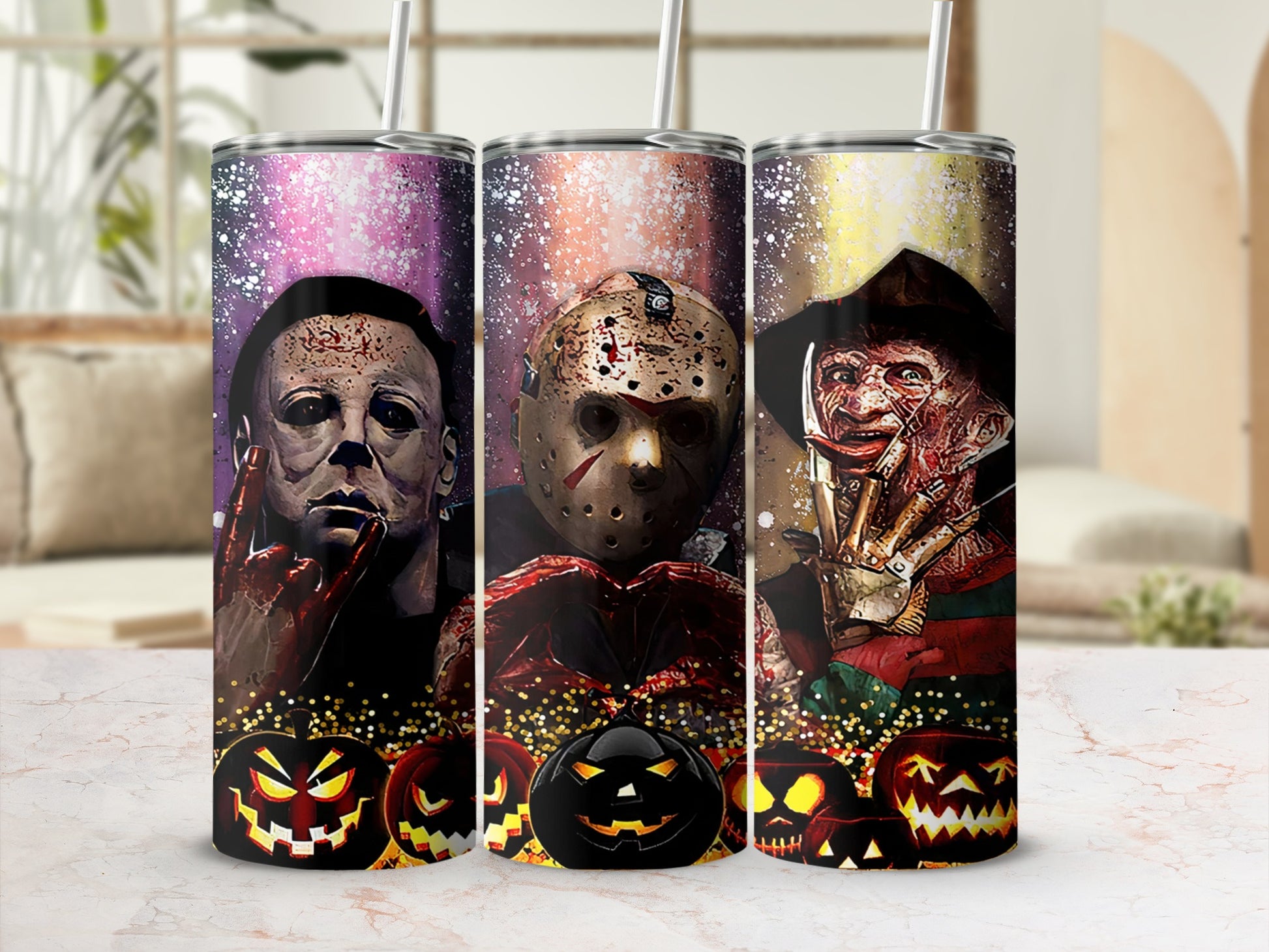 Three tumblers feature horror movie characters: Michael Myers, Jason Voorhees, and Freddy Krueger, with jack-o'-lanterns.