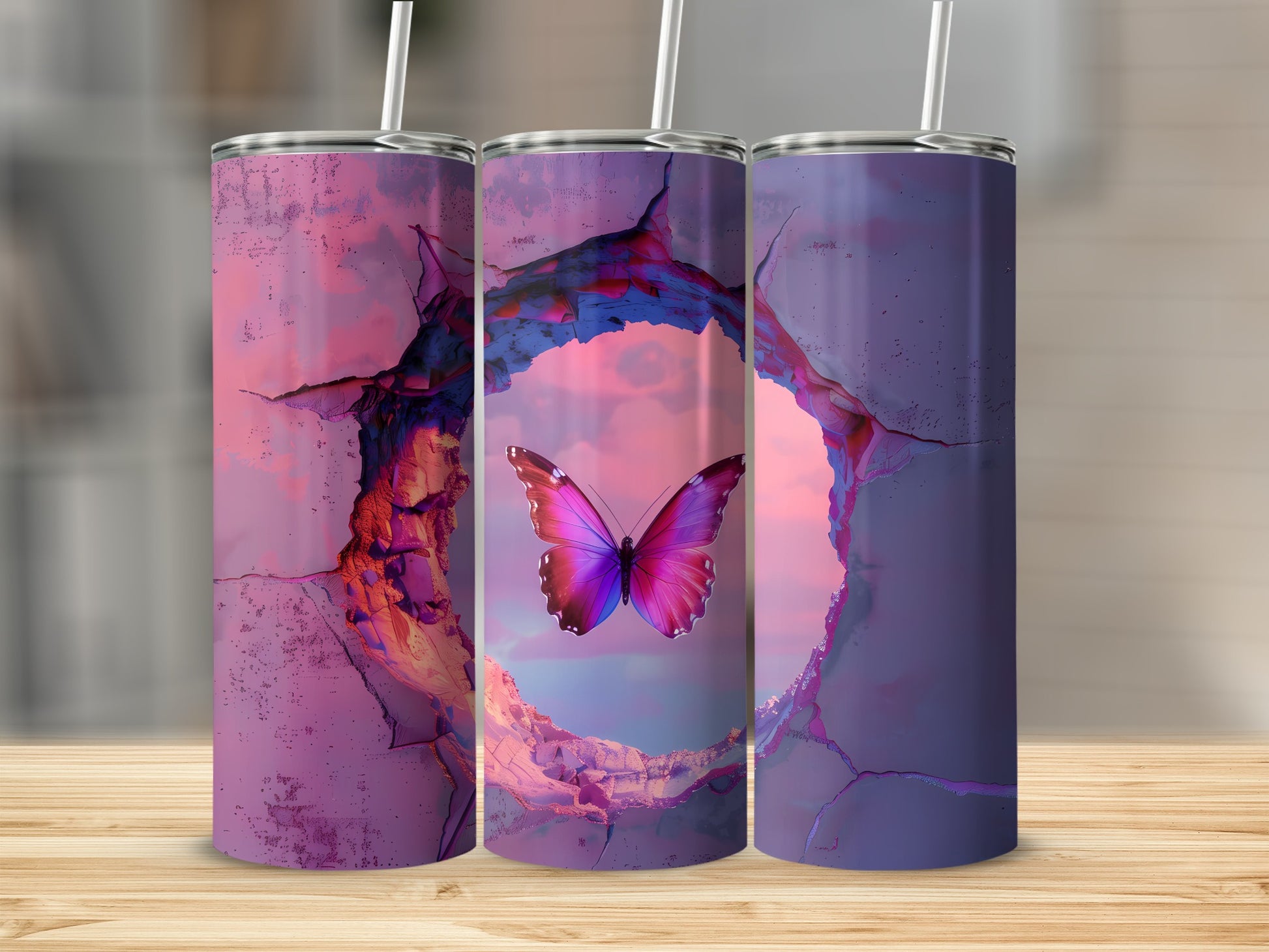 Three tumblers with cracked purple and pink backgrounds and a butterfly within a circular opening.
