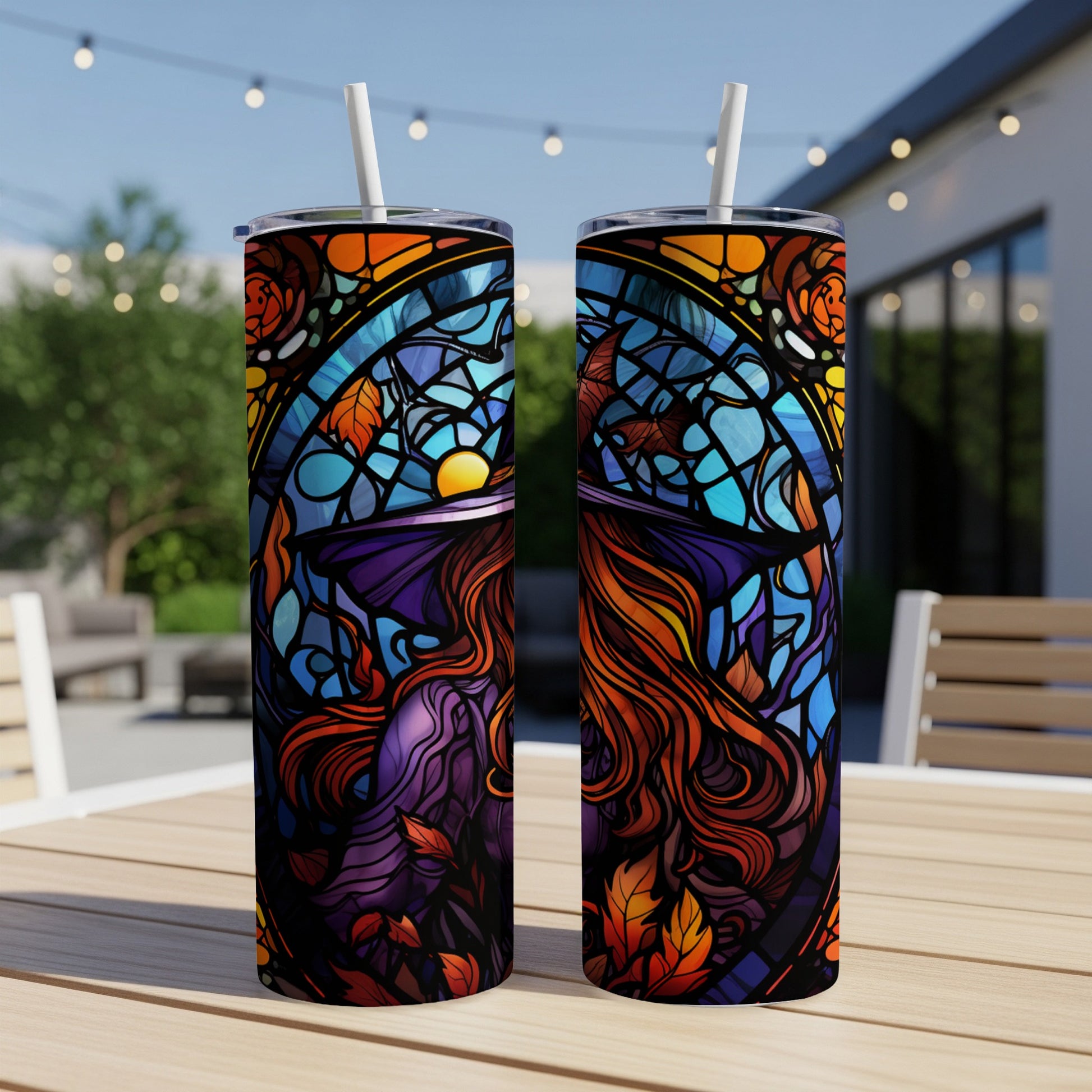 Two stained glass tumblers with a witch and autumn leaves design.