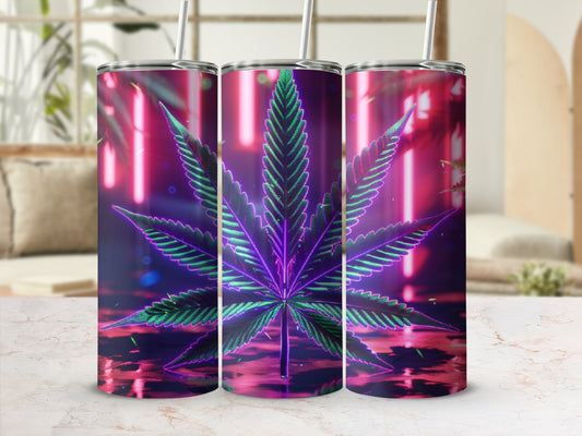 Tall tumbler with neon cannabis leaf design on reflective surface.