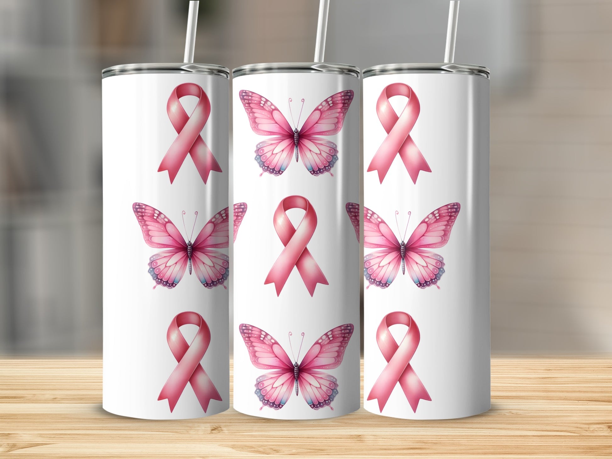 Pink ribbon and butterfly design on a white tumbler.