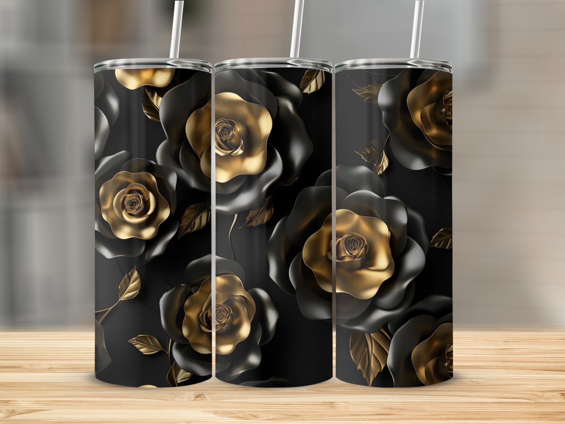 Black tumbler with gold rose pattern and straw.
