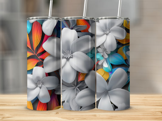 Three tumblers featuring white floral designs and colorful abstract backgrounds.