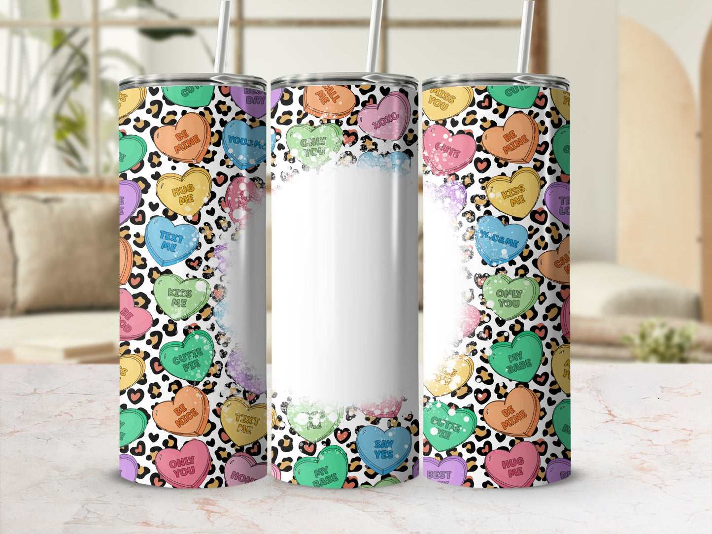 Leopard print tumbler with colorful hearts saying "Be Mine", "XOXO", and "Cutie Pie".