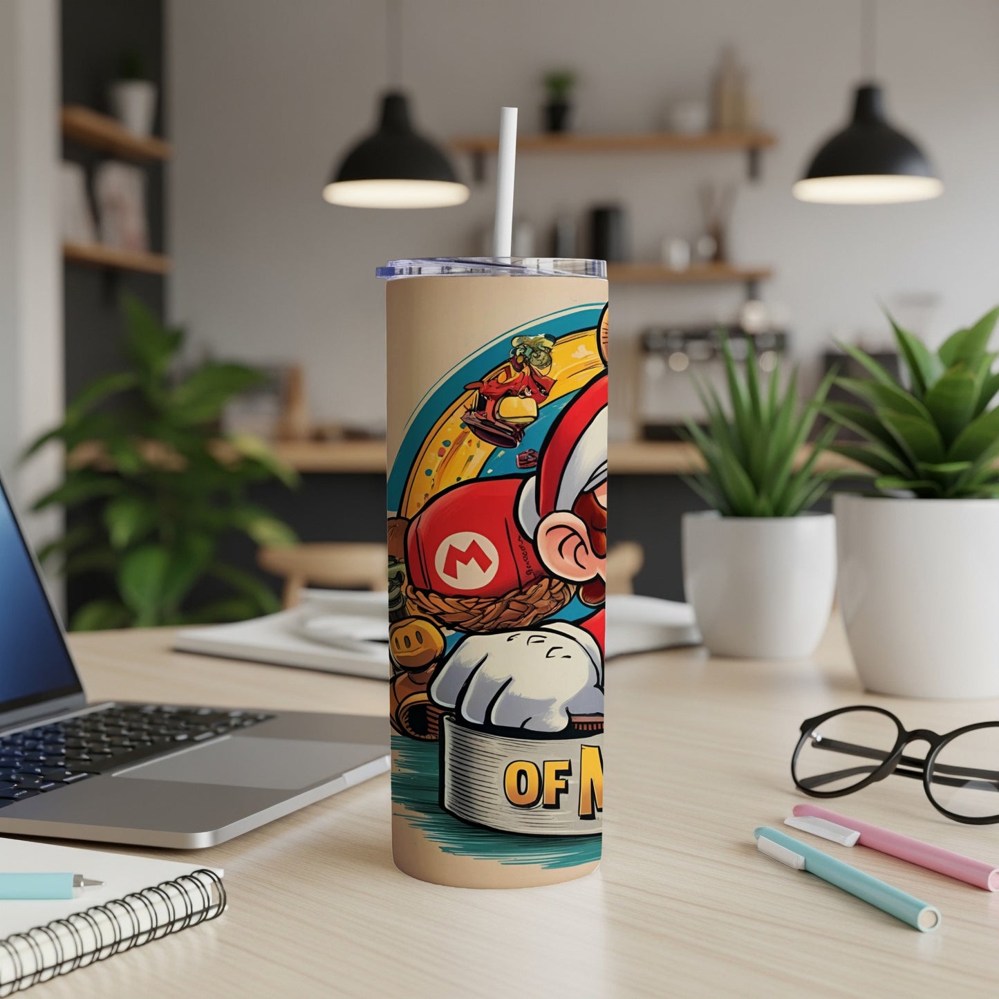 Mario character on a tumbler with a straw, on a desk.