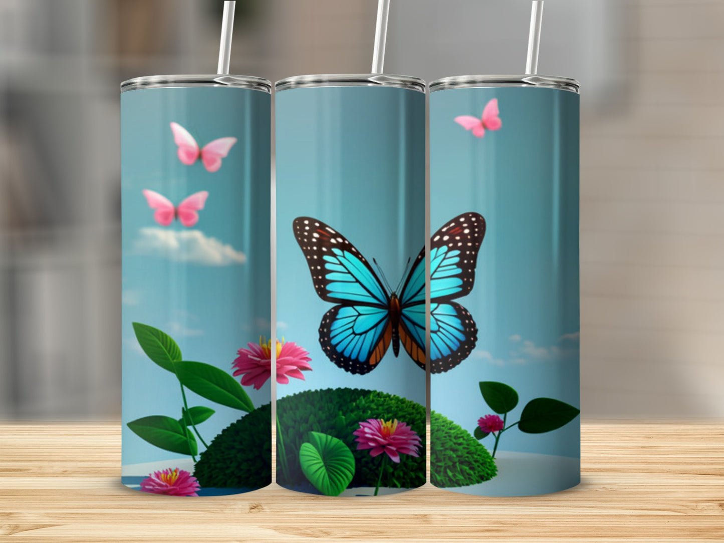 Blue butterfly and pink flowers on a tropical scene, three tumblers.