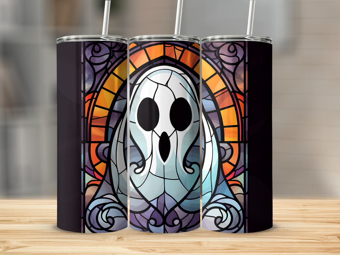 Ghost in stained glass design on a black tumbler with a straw.