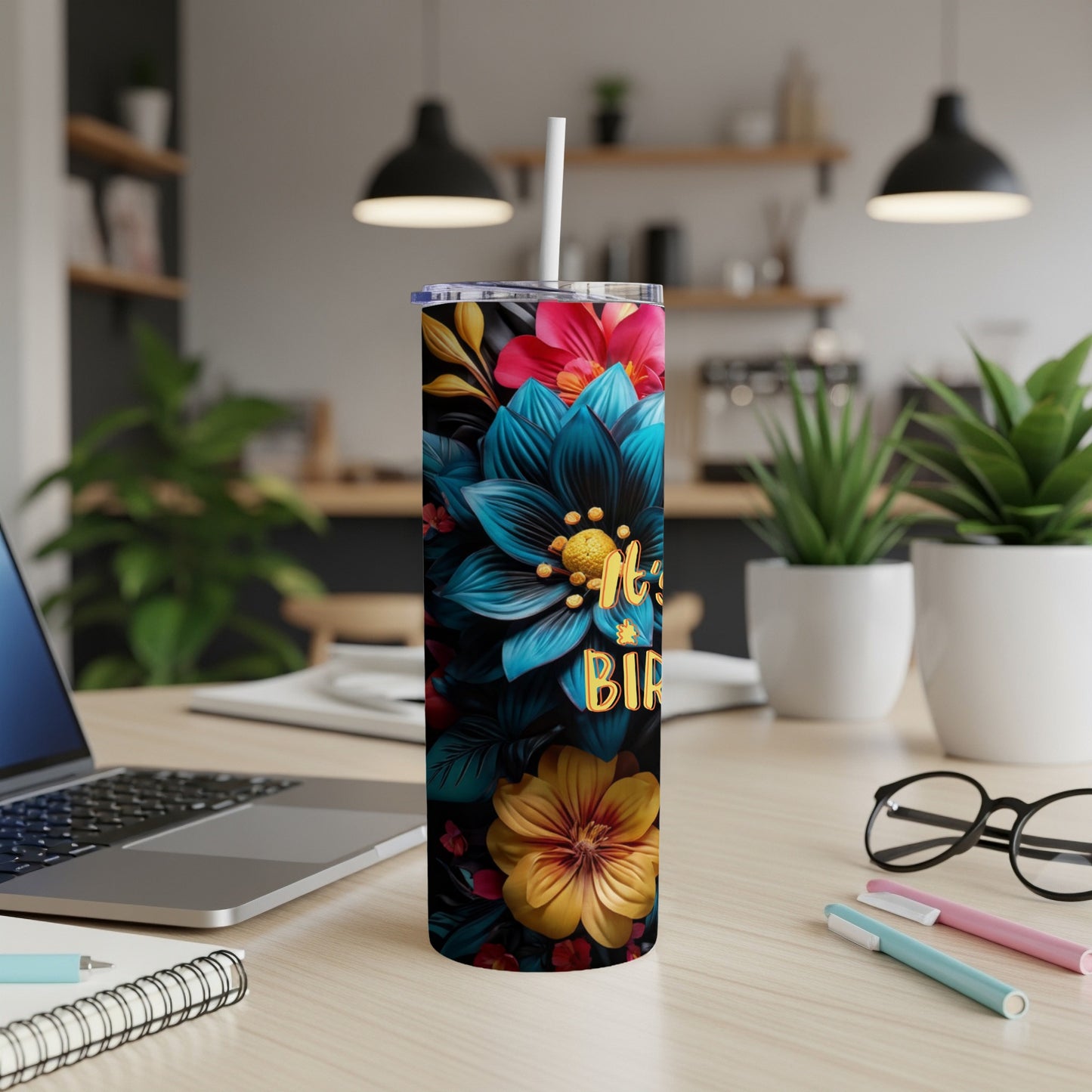 Floral patterned tumbler with "Happy Birthday" text in gold lettering.