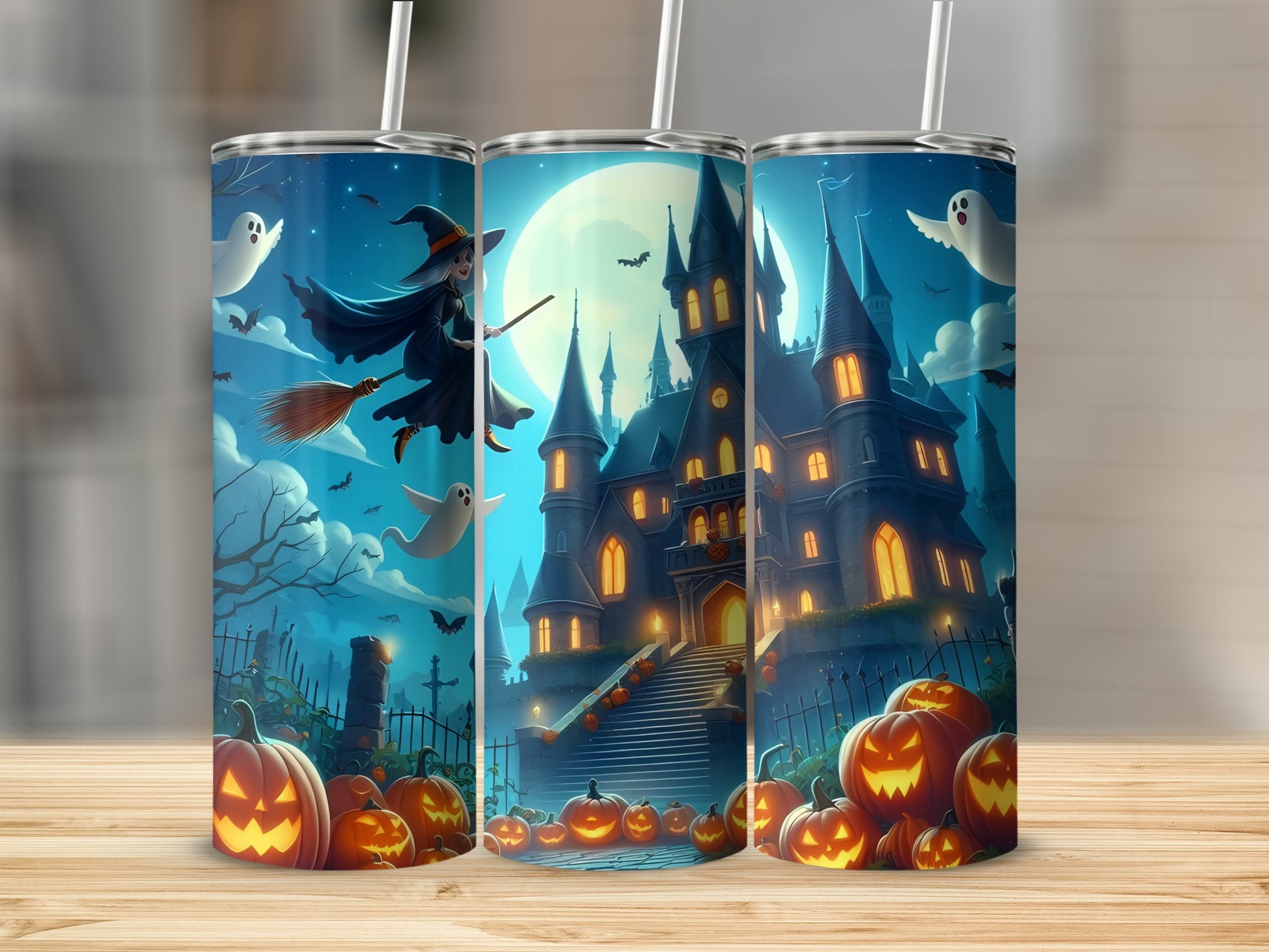 Halloween tumblers with a haunted castle, witch, ghosts, bats, and pumpkins.