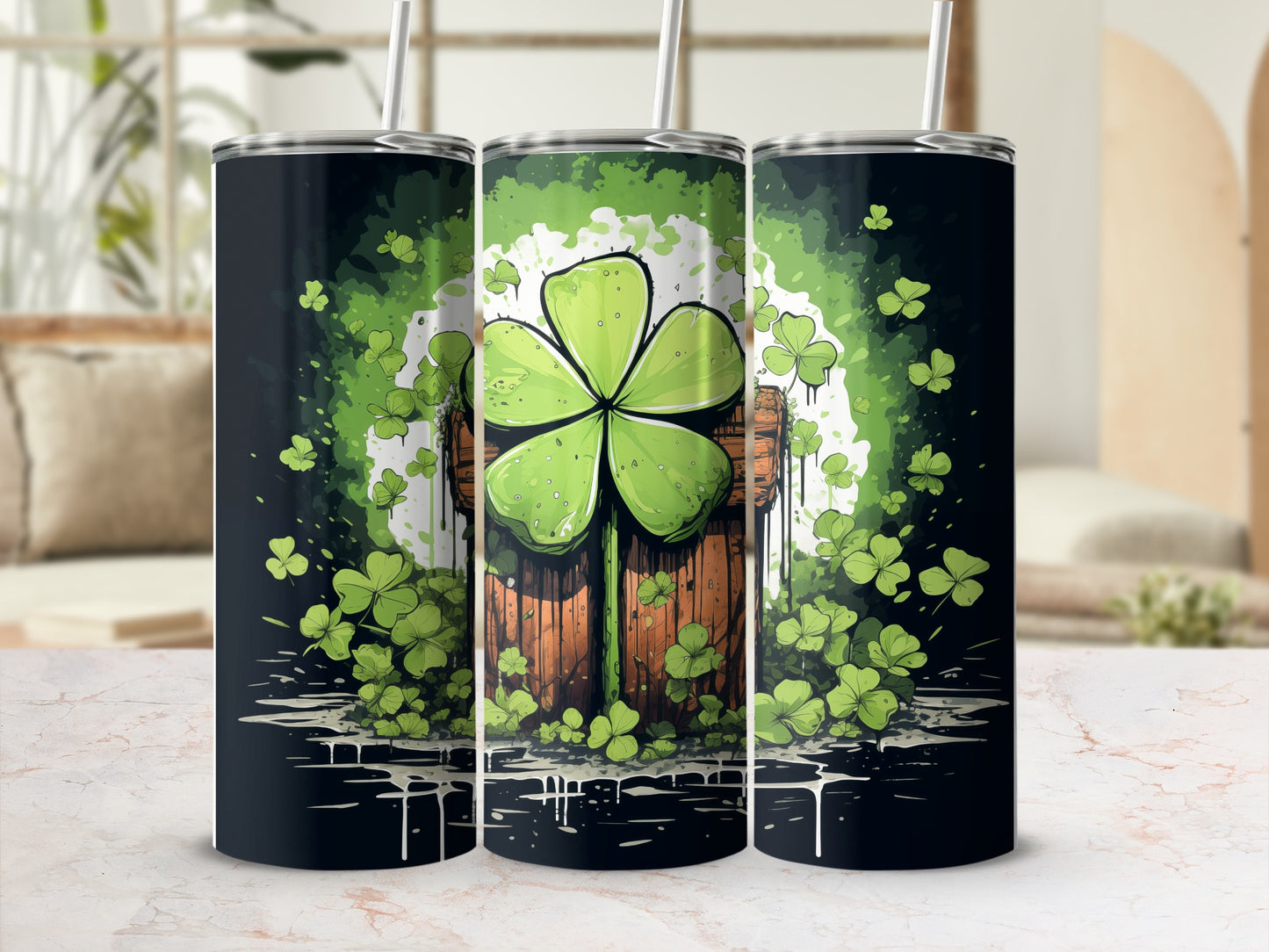 Three tumblers with a St. Patrick's Day theme featuring shamrocks and a wooden barrel.