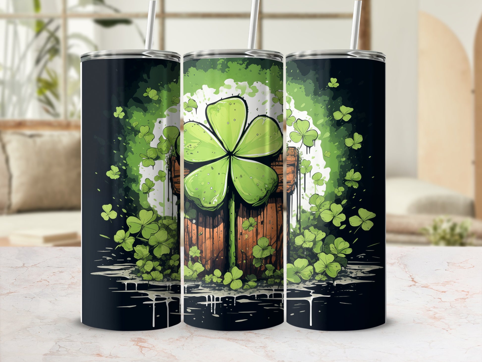 Three tumblers with a St. Patrick's Day theme featuring shamrocks and a wooden barrel.