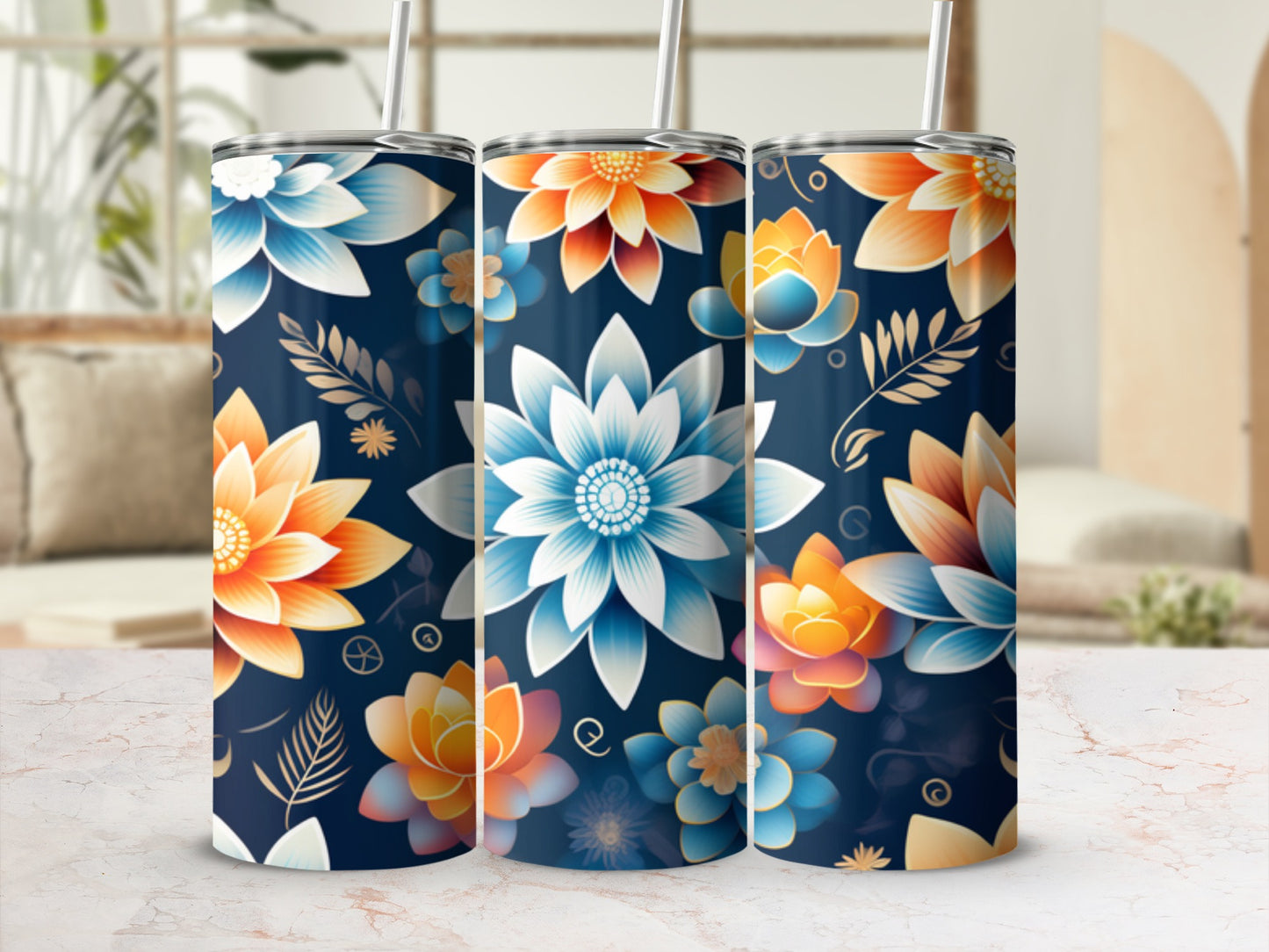 Three floral tumblers with orange, blue, and white blooms on a dark blue background.