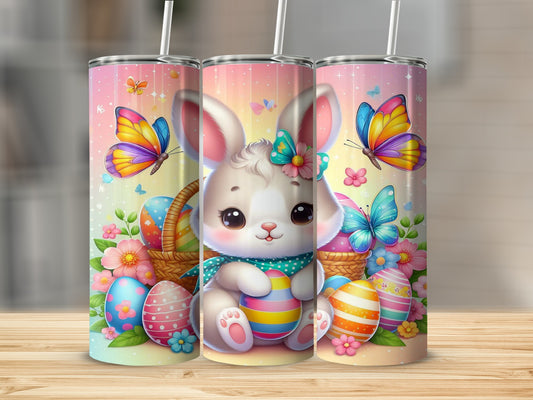 Easter bunny with colorful eggs and butterflies on a pink tumbler.