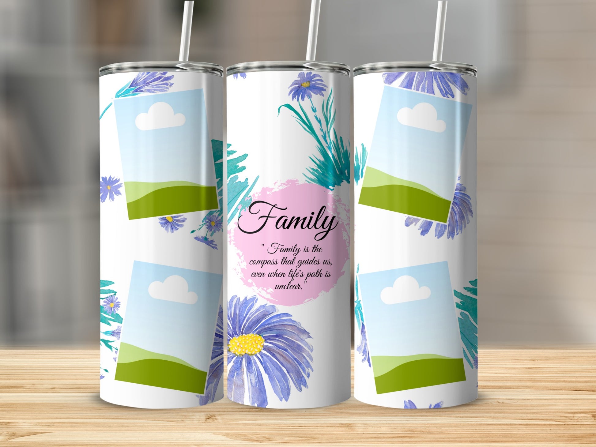 Tumblers with floral designs and the text "Family is the compass that guides us."