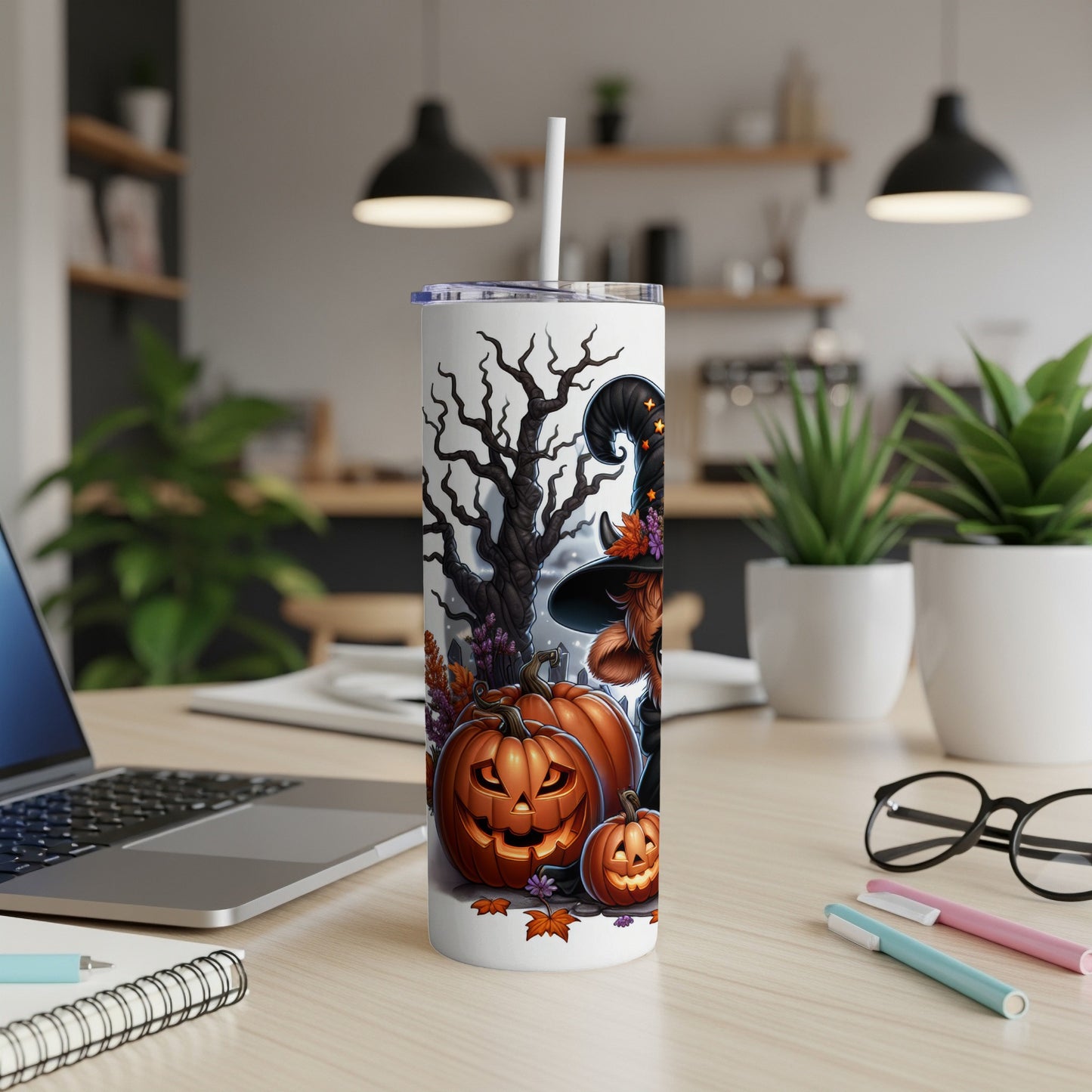 Witch and pumpkins on Halloween tumbler with white straw.