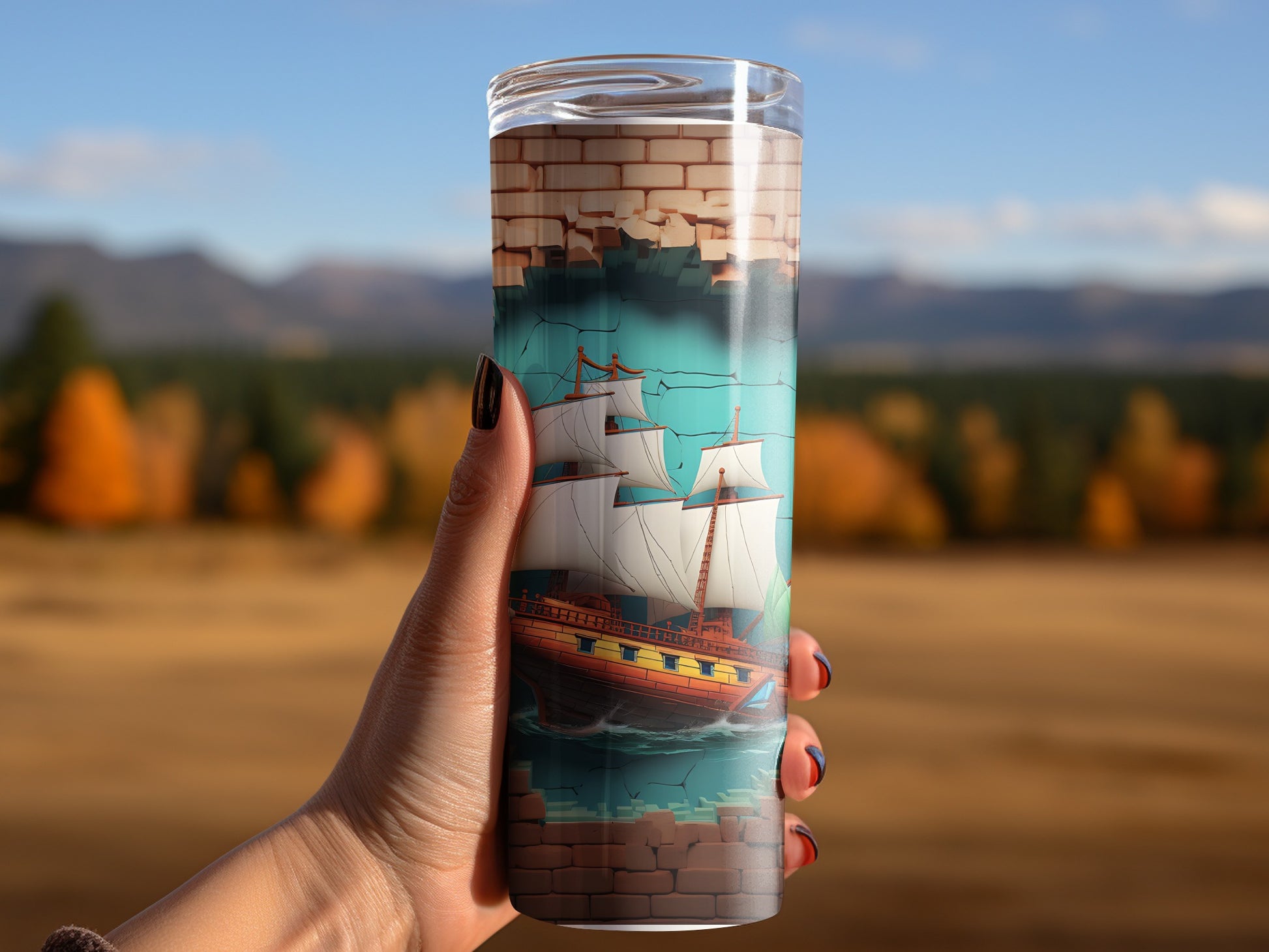 Tall travel tumbler with ship sailing design
