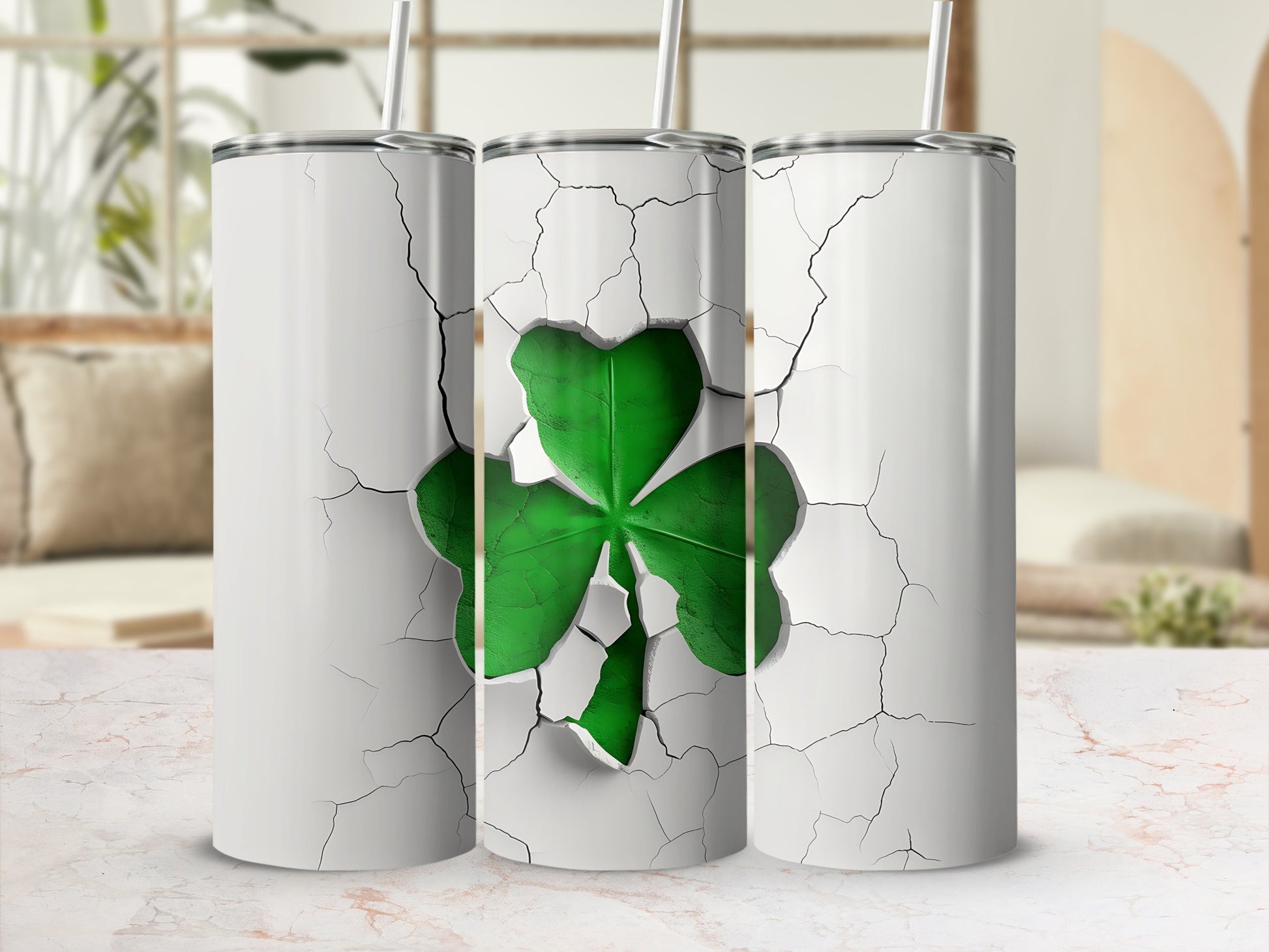 White tumbler with cracked design revealing a green shamrock.