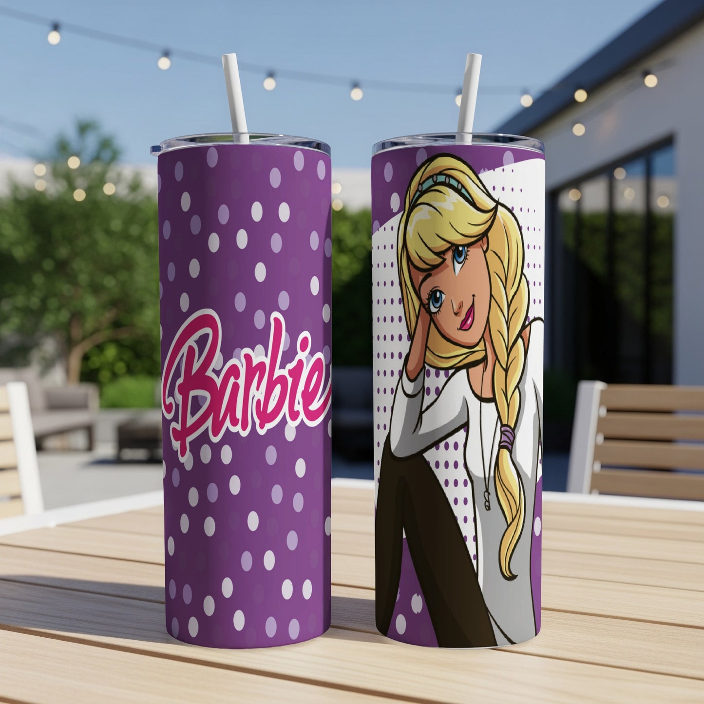 Barbie tumbler with polka dots and a portrait of Barbie.