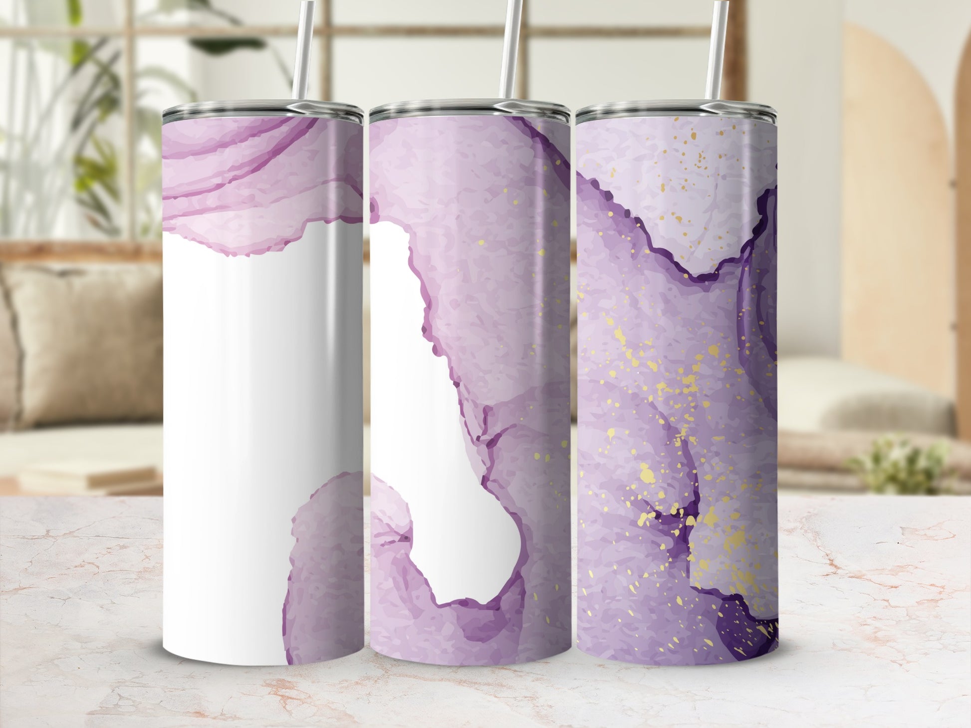 Three white tumblers with purple watercolor and gold splatter designs.