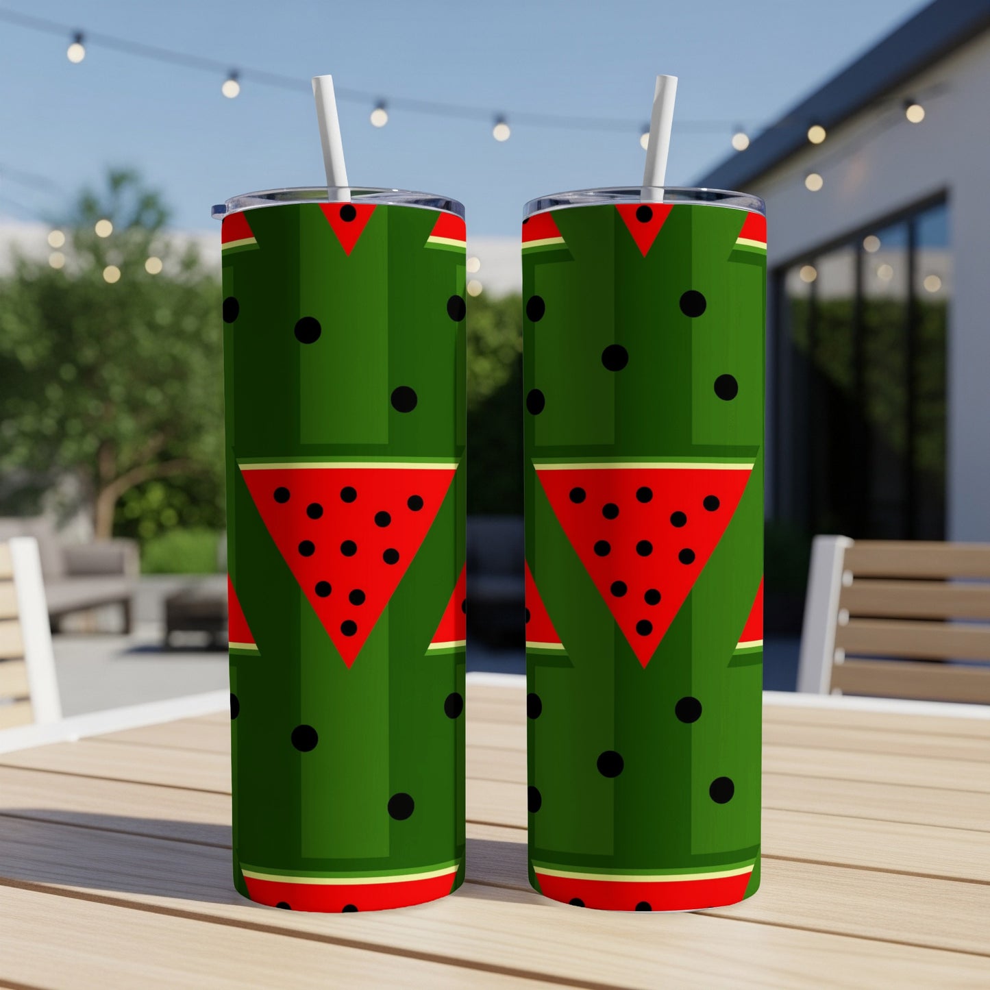 Two green tumblers with watermelon slice patterns and black dots.