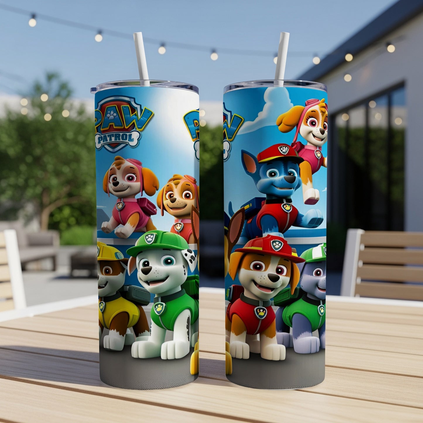 Paw Patrol characters Skye, Chase, and Marshall on a blue and white tumbler.