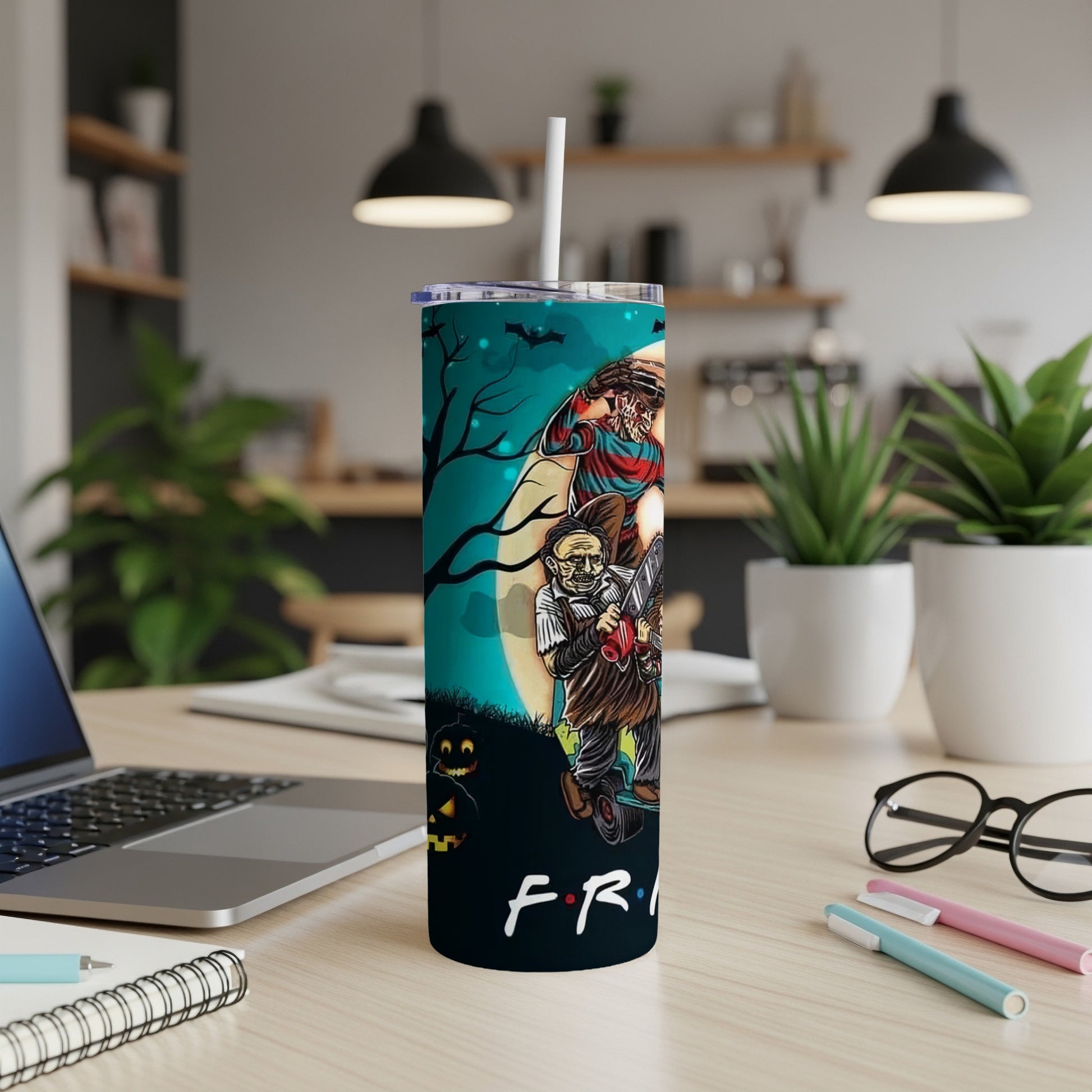 Tumbler with Freddy Krueger, Leatherface, and Jack-o'-lanterns with "Friends" logo.