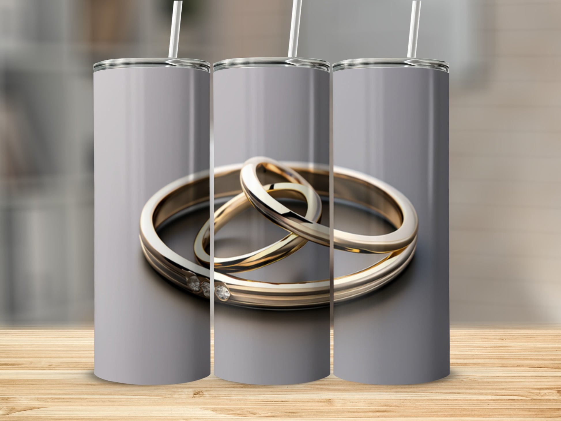 Three wedding rings with diamonds on a gray background.