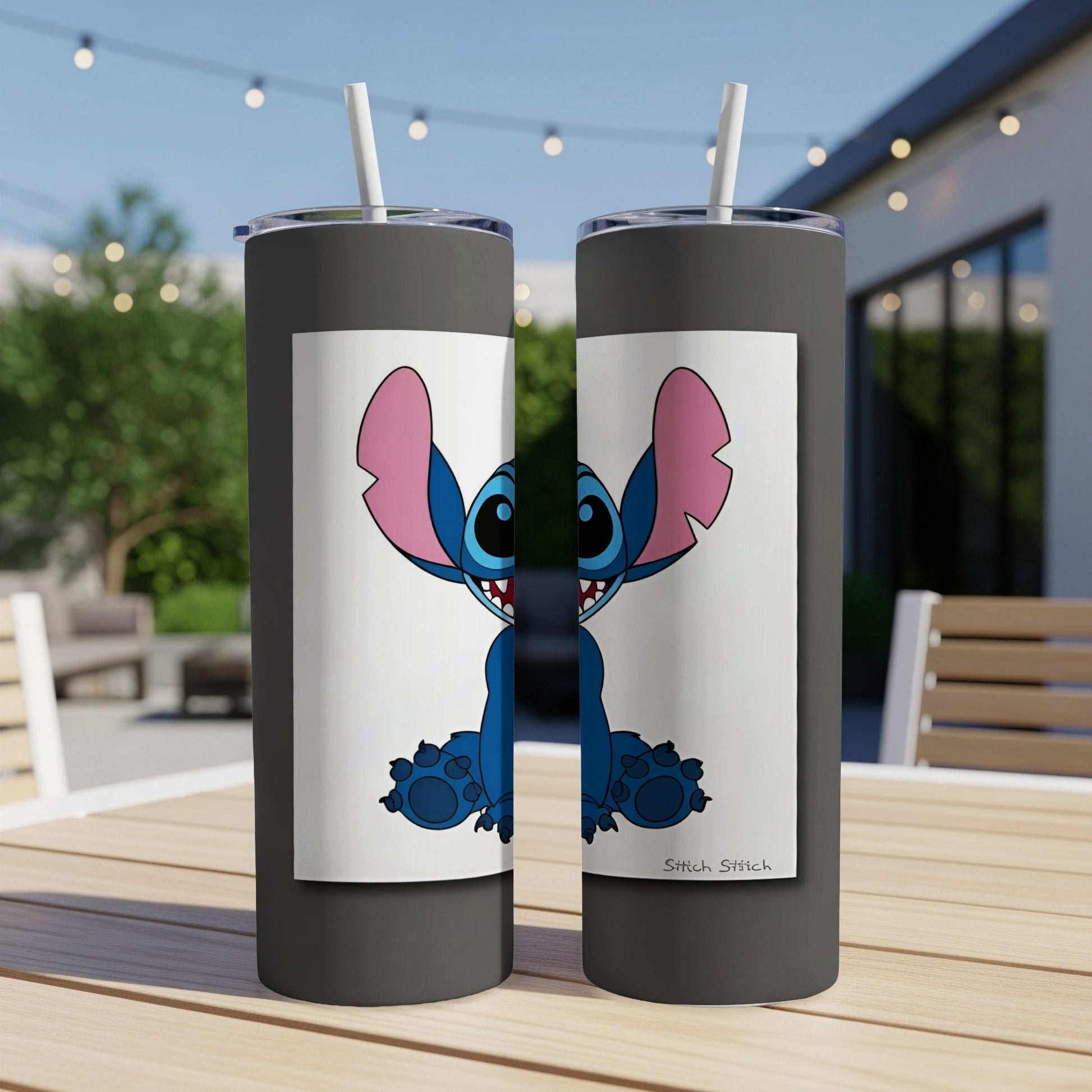 Two dark tumblers with Stitch illustration and text "Stitch Stitch".