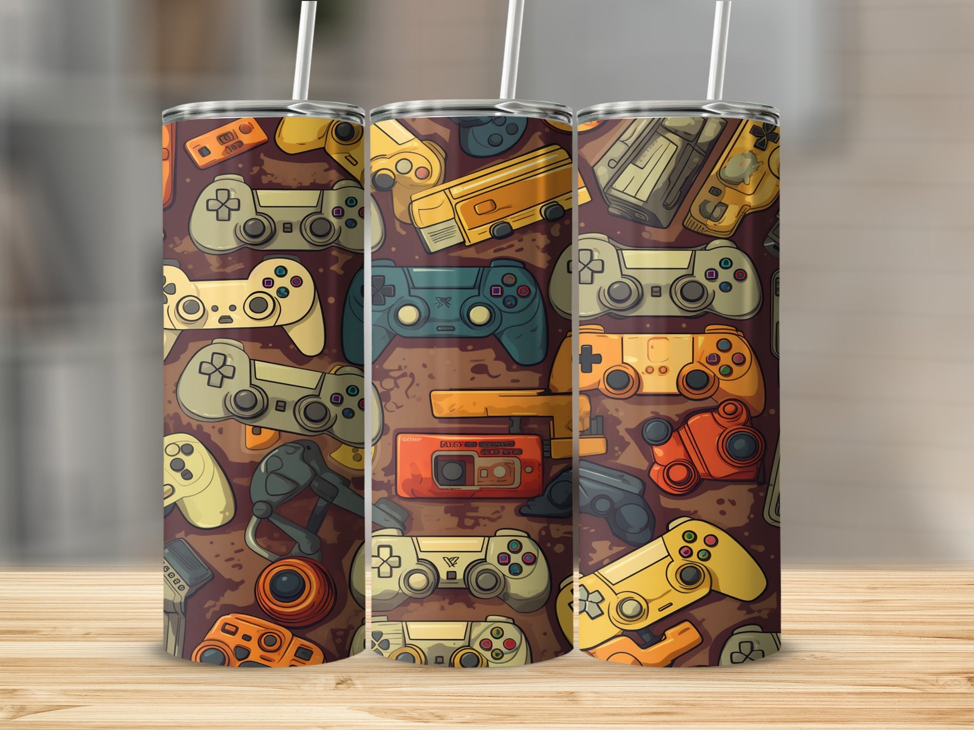 Triptych of tumblers with vintage video game controllers and accessories pattern.