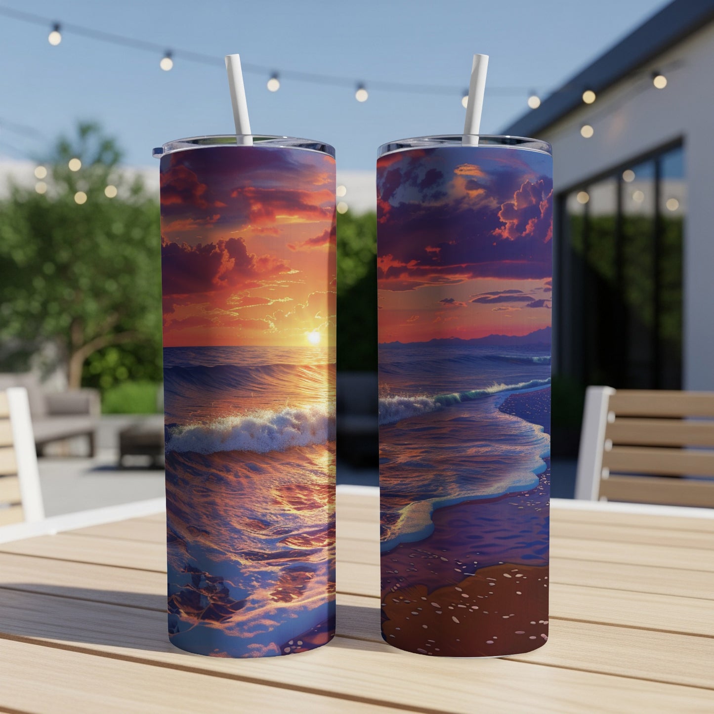 Two tumblers featuring a vibrant sunset over a wavy ocean.