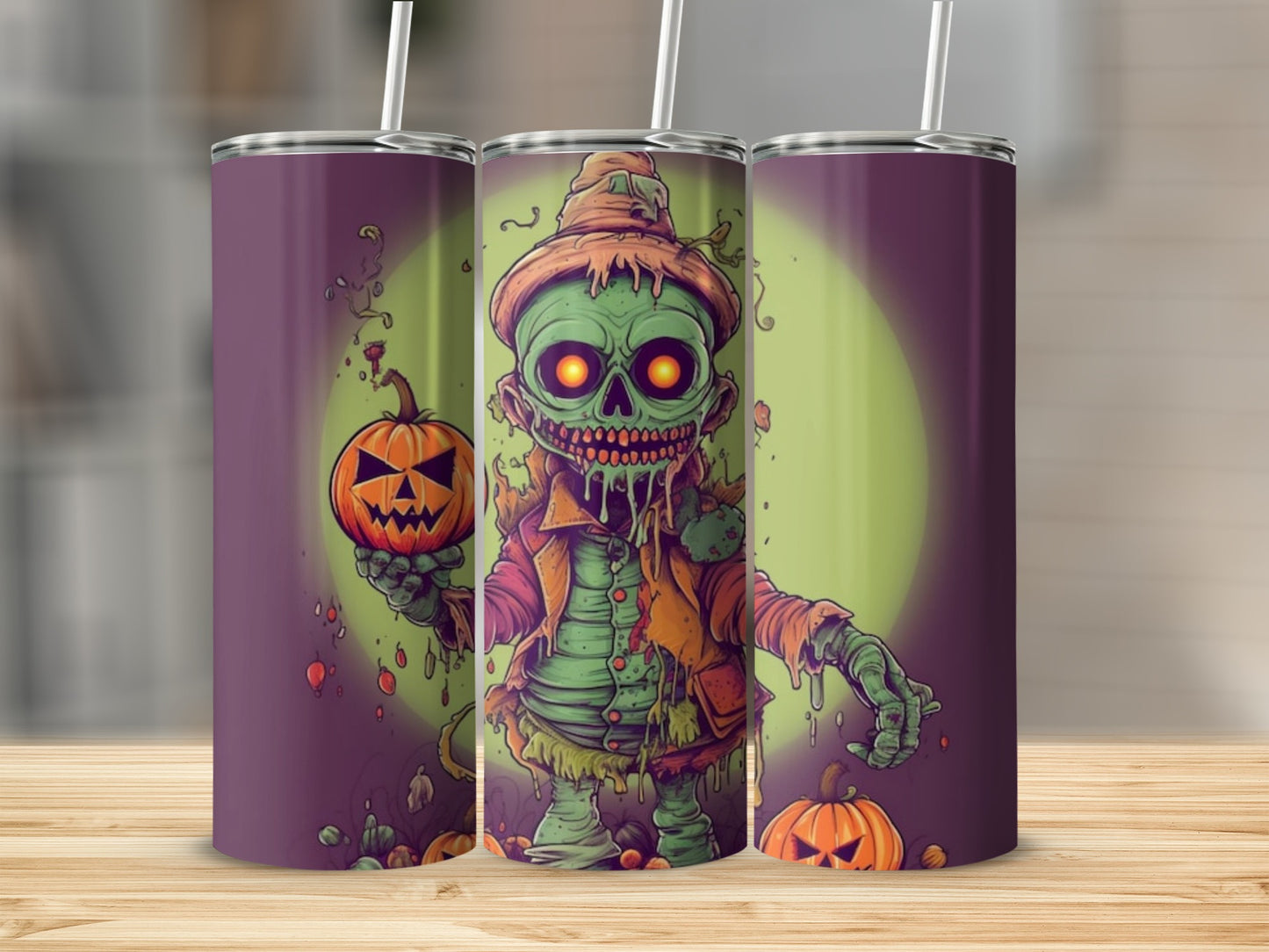Three tumblers with a cartoon zombie and jack-o'-lantern Halloween design.