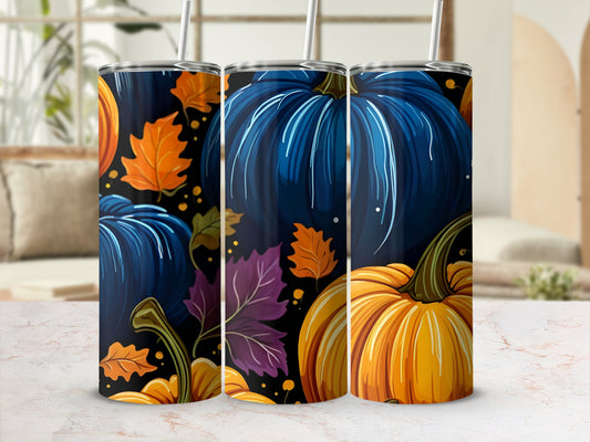 Three tumblers featuring pumpkins and fall leaves designs.