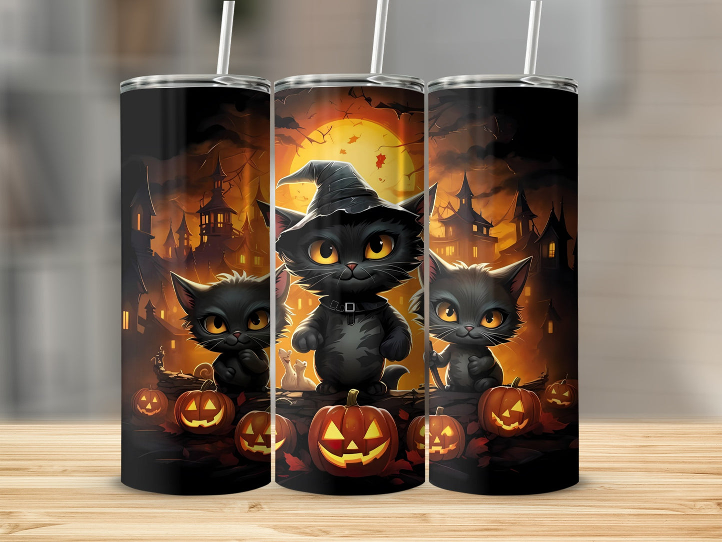 Three tumblers featuring black cats, jack-o'-lanterns, and haunted houses with a full moon.