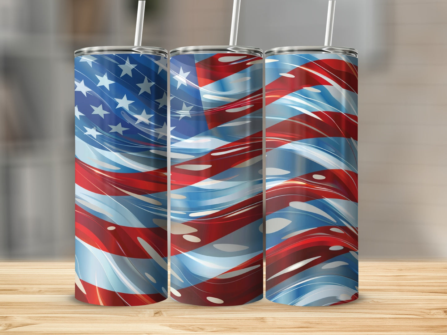 Three tumblers with a wavy American flag design stand on a wooden surface.