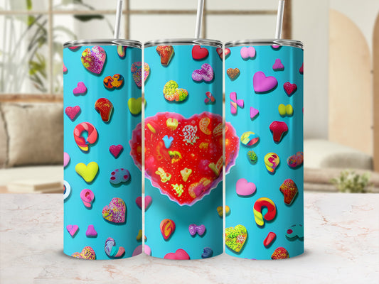 Turquoise tumbler with colorful hearts, candies, and sprinkles, featuring a large central heart.
