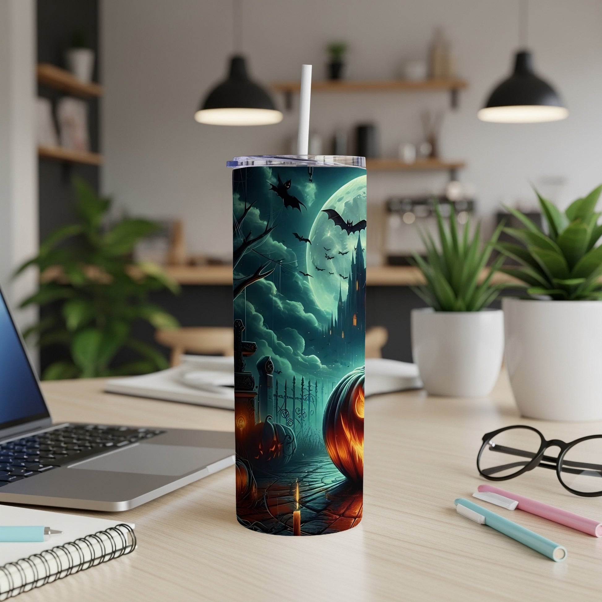 Tumbler with a spooky Halloween scene: castle, bats, pumpkins, and moon.