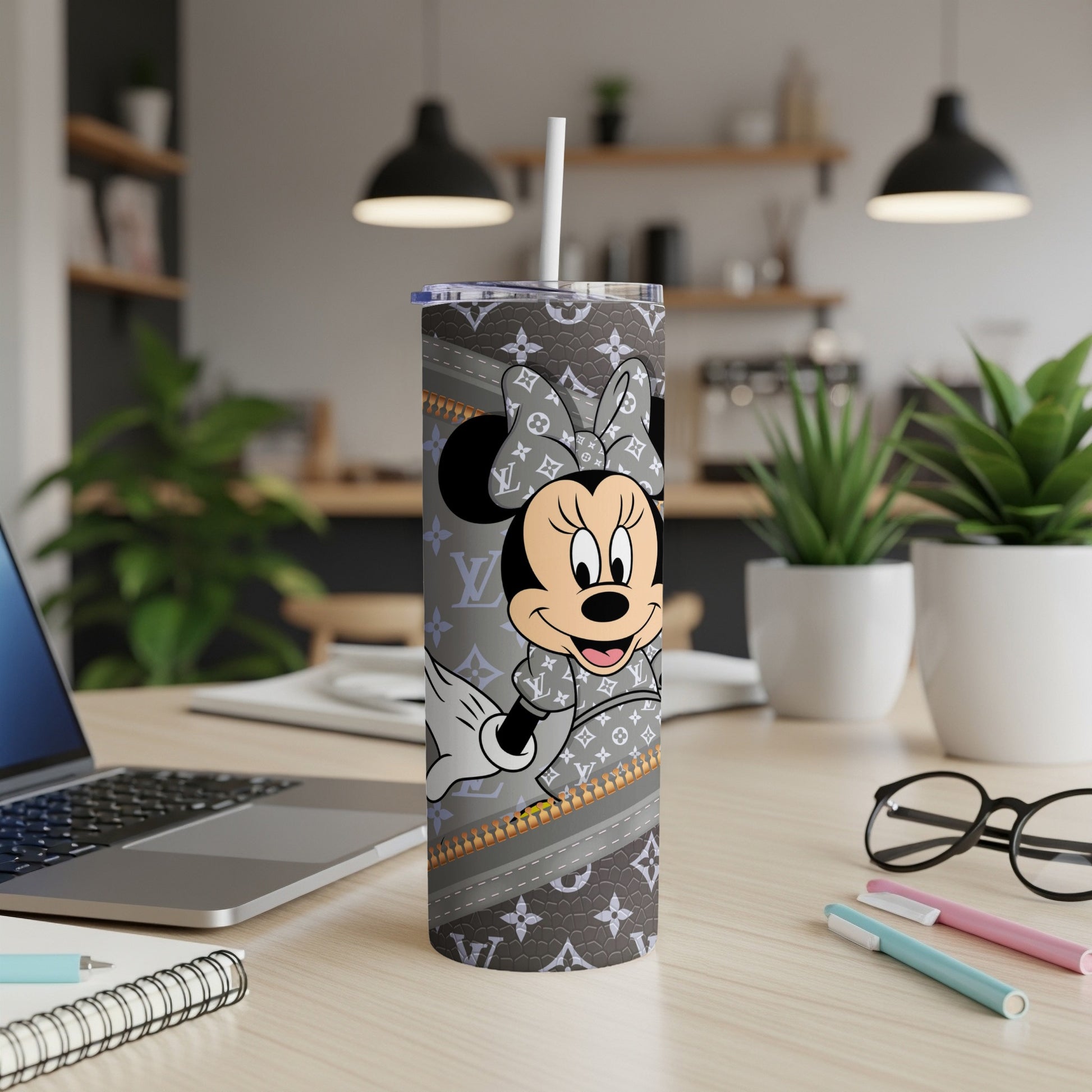 Minnie Mouse tumbler with gray Louis Vuitton-inspired pattern and white straw.