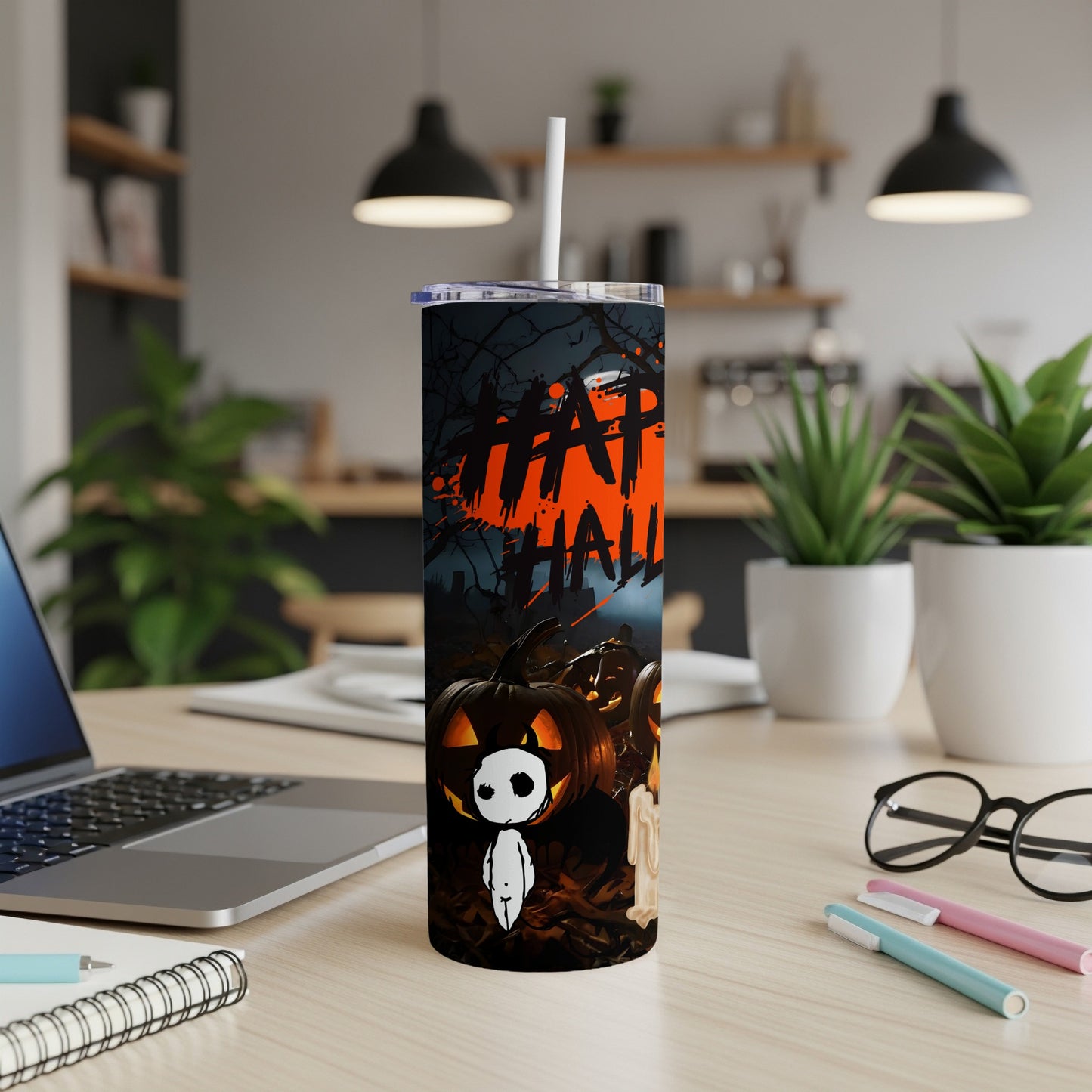 Halloween tumbler with pumpkins and "HAP HALL" text.