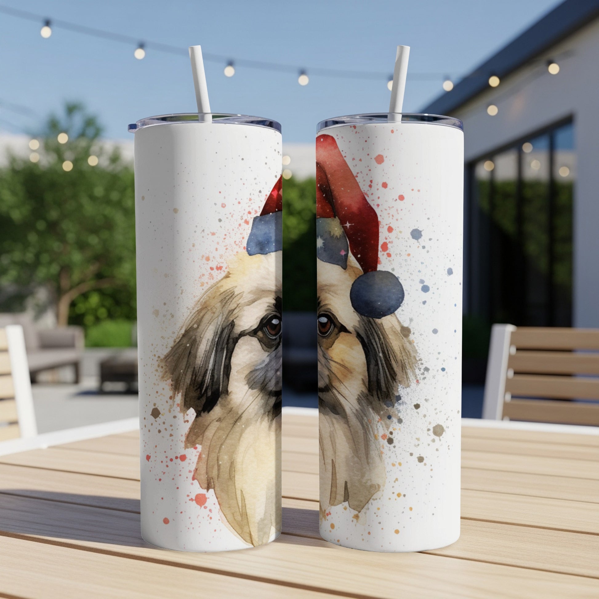 Watercolor Shih Tzu in Santa hat on white tumbler, outdoor setting.