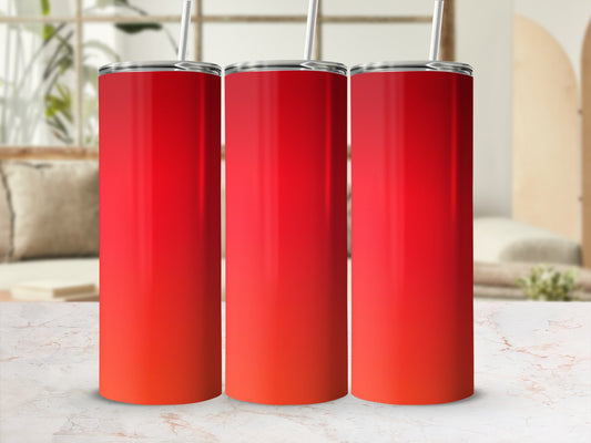 Three red gradient tumblers with straws, displayed on a marble surface.