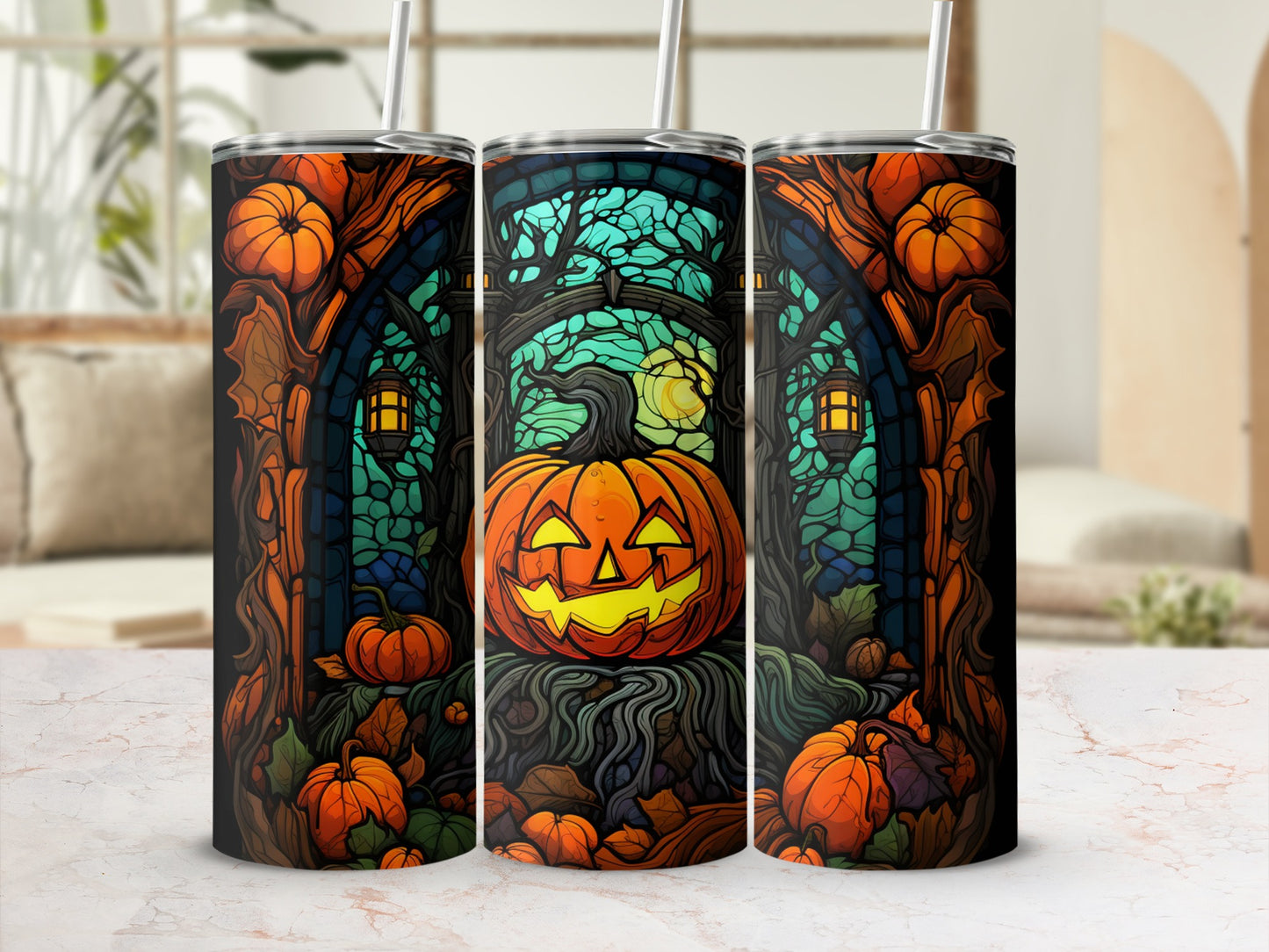 Halloween pumpkin illustration on three tumblers with a spooky forest background.