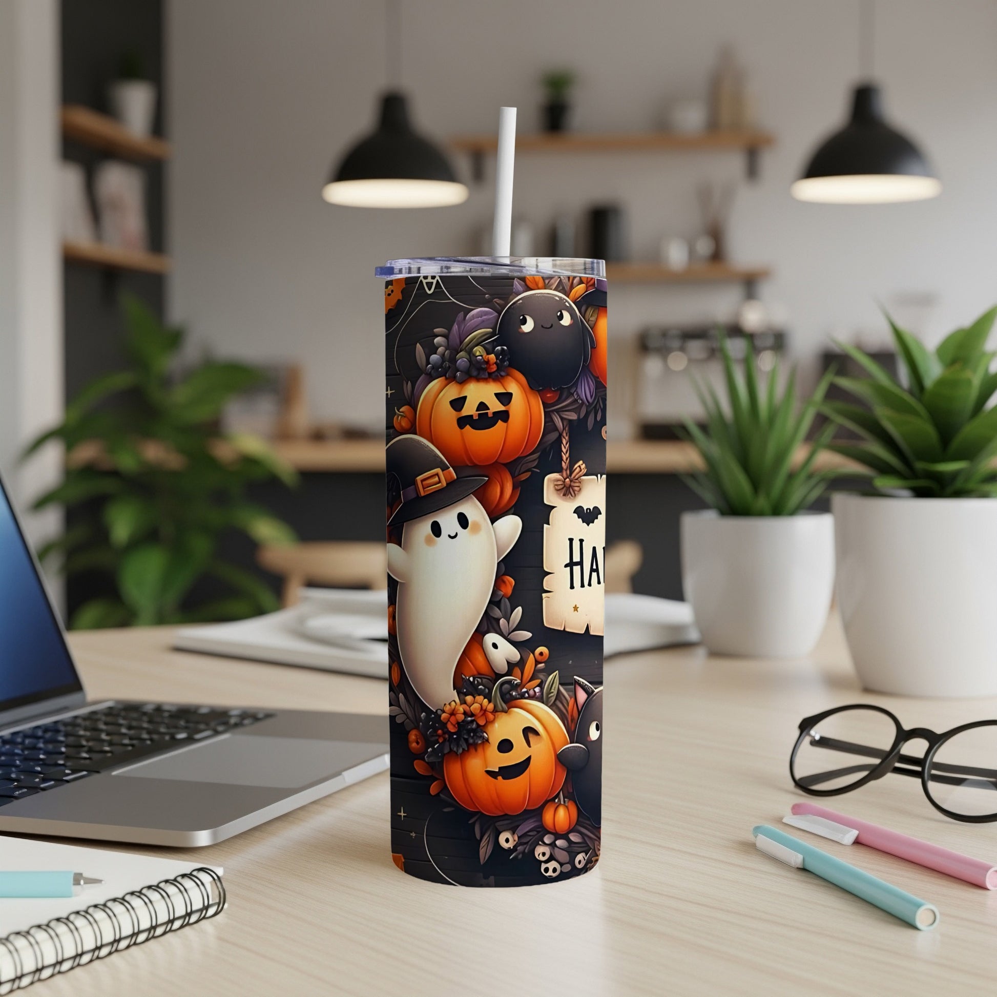 Halloween tumbler with ghost, pumpkins, and bats.