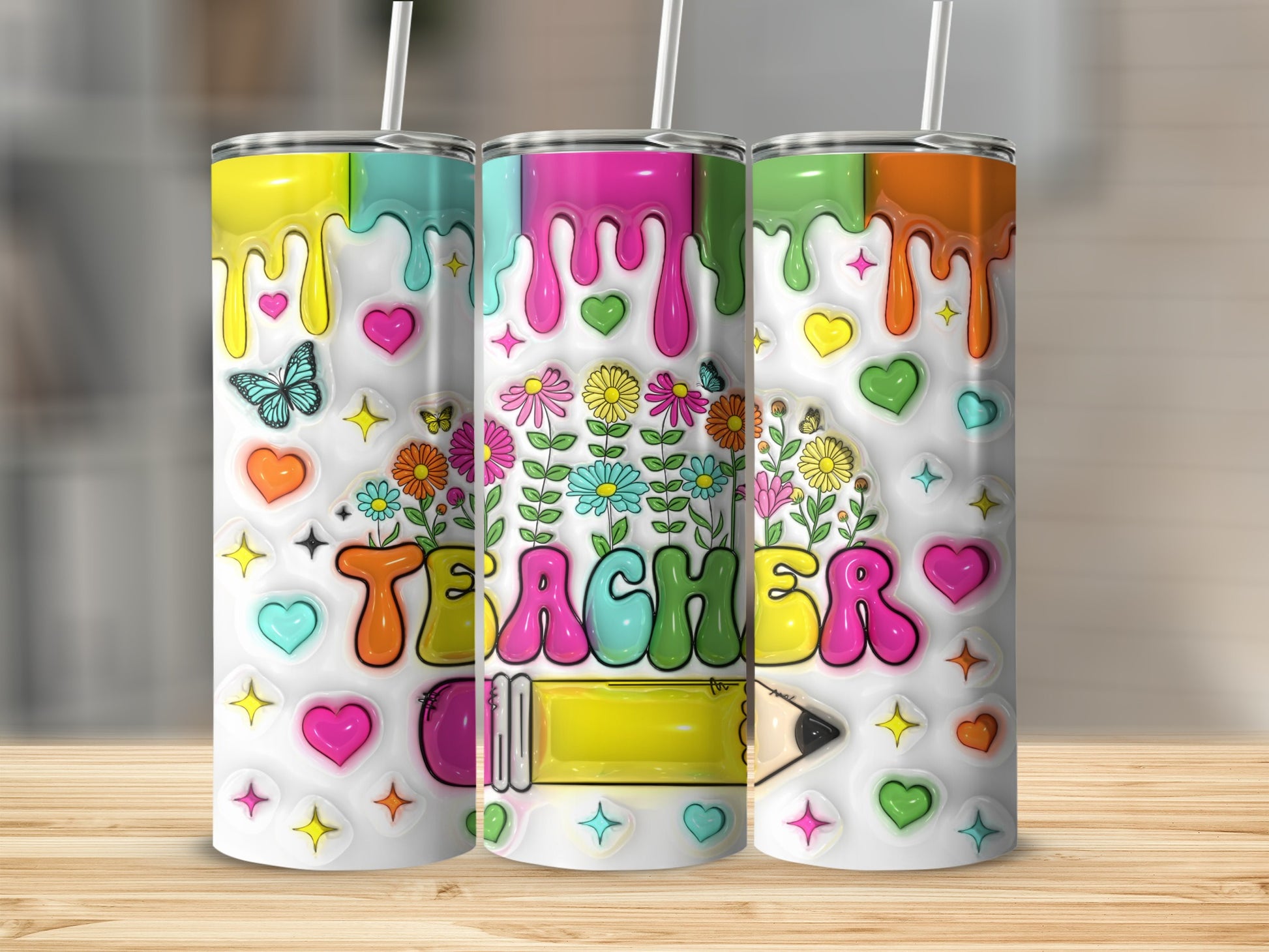 Teacher tumbler with colorful dripping paint, flowers, hearts, stars, and butterflies.