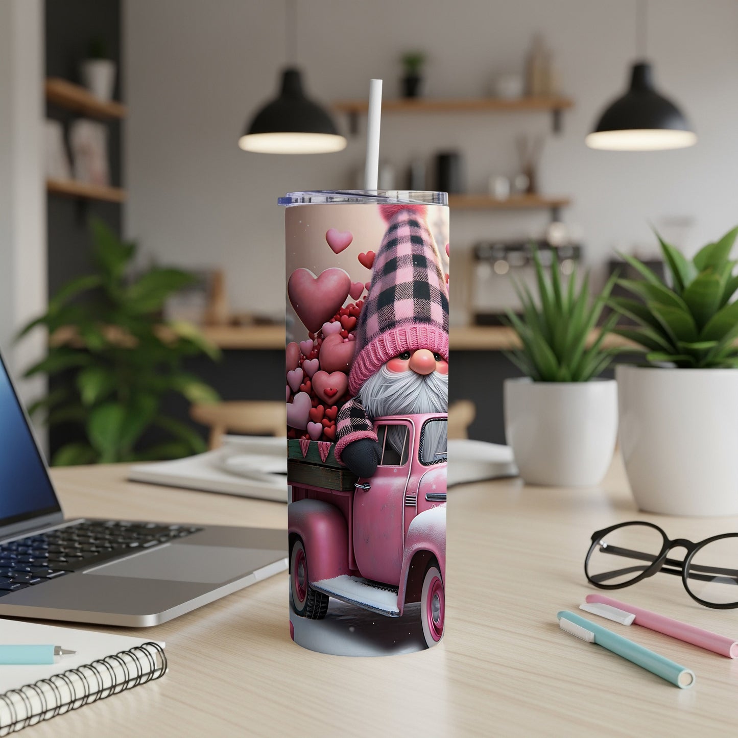 Pink gnome truck filled with hearts on a tumbler.