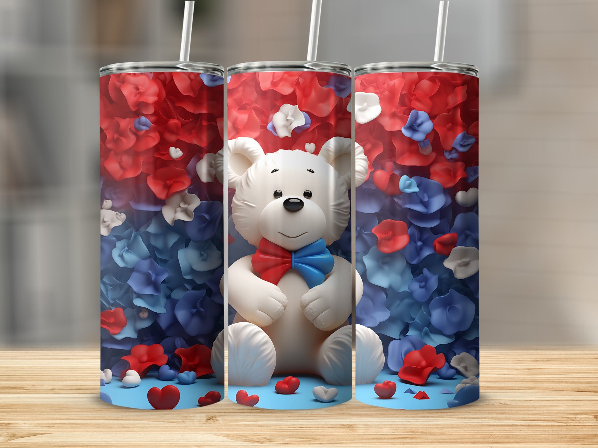 White teddy bear with red, white, and blue floral background on tumblers.