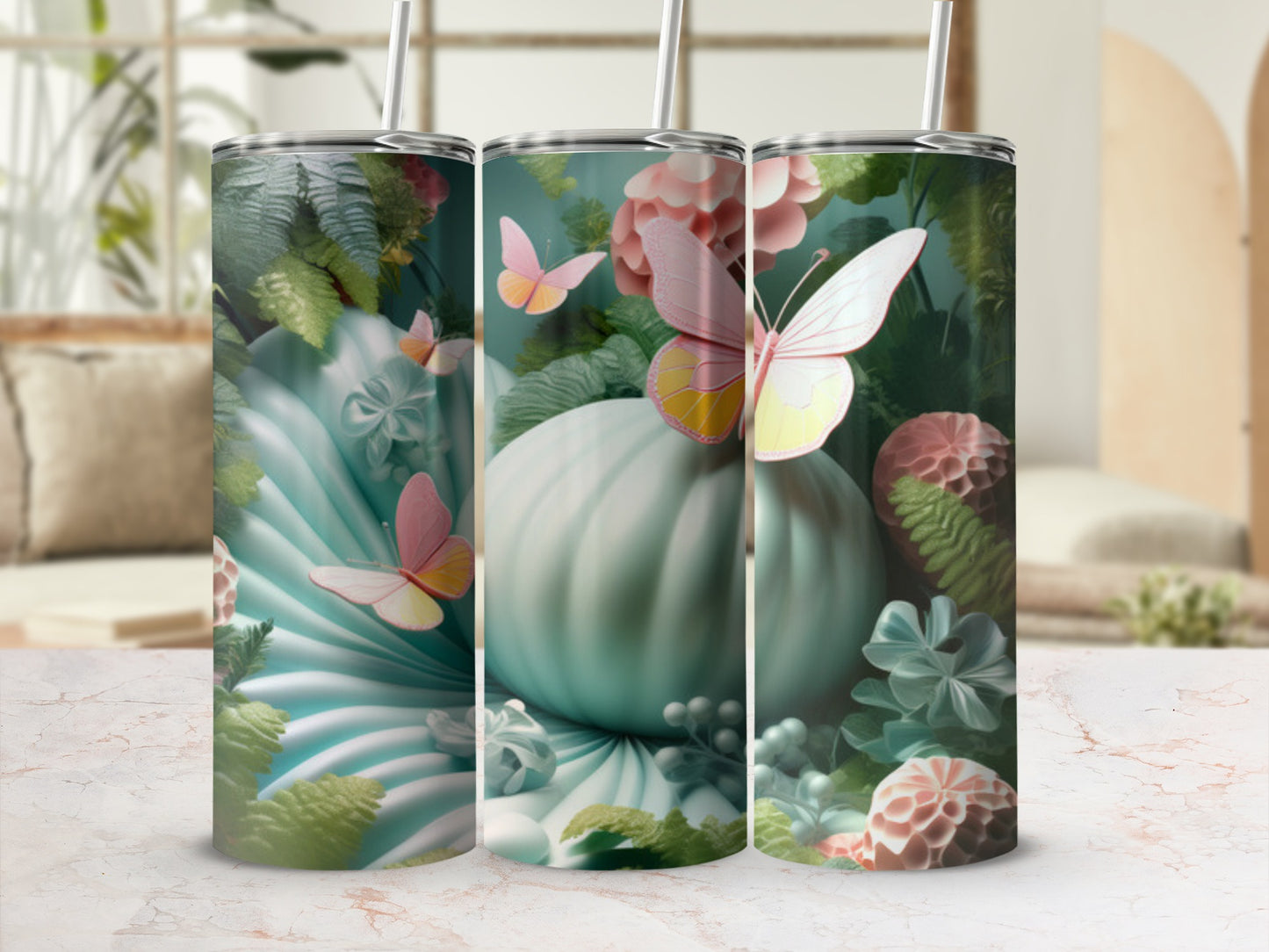 Mint green pumpkin, butterflies, and floral accents on a tumbler.