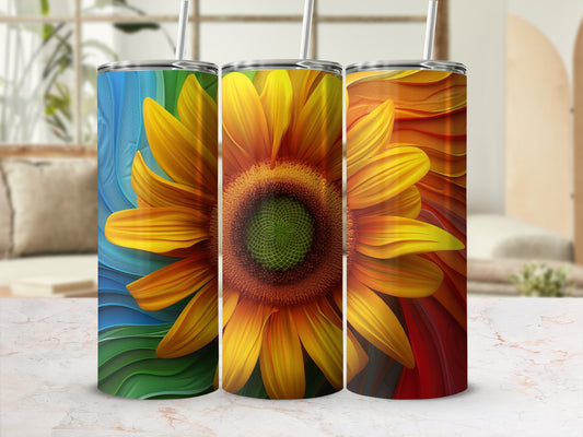 Three tumblers with colorful sunflower designs, against a blurred background.