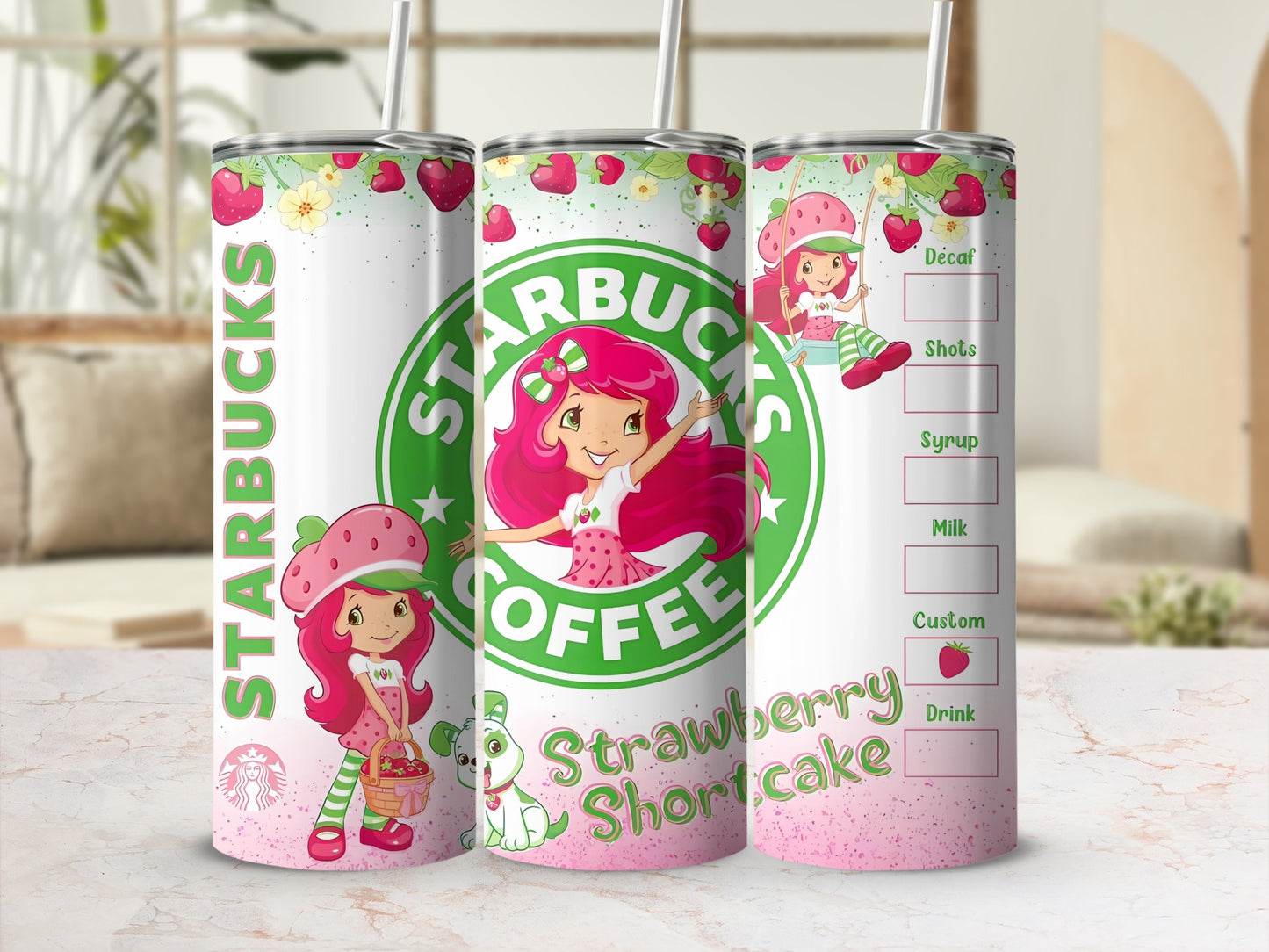 Strawberry Shortcake Starbucks tumbler with colorful illustrations.