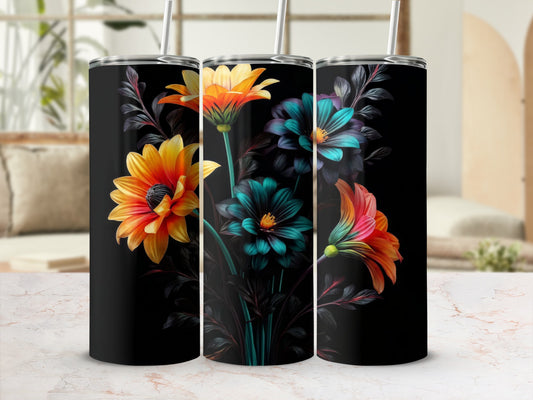 Black tumbler with vibrant orange, yellow, and teal floral design.