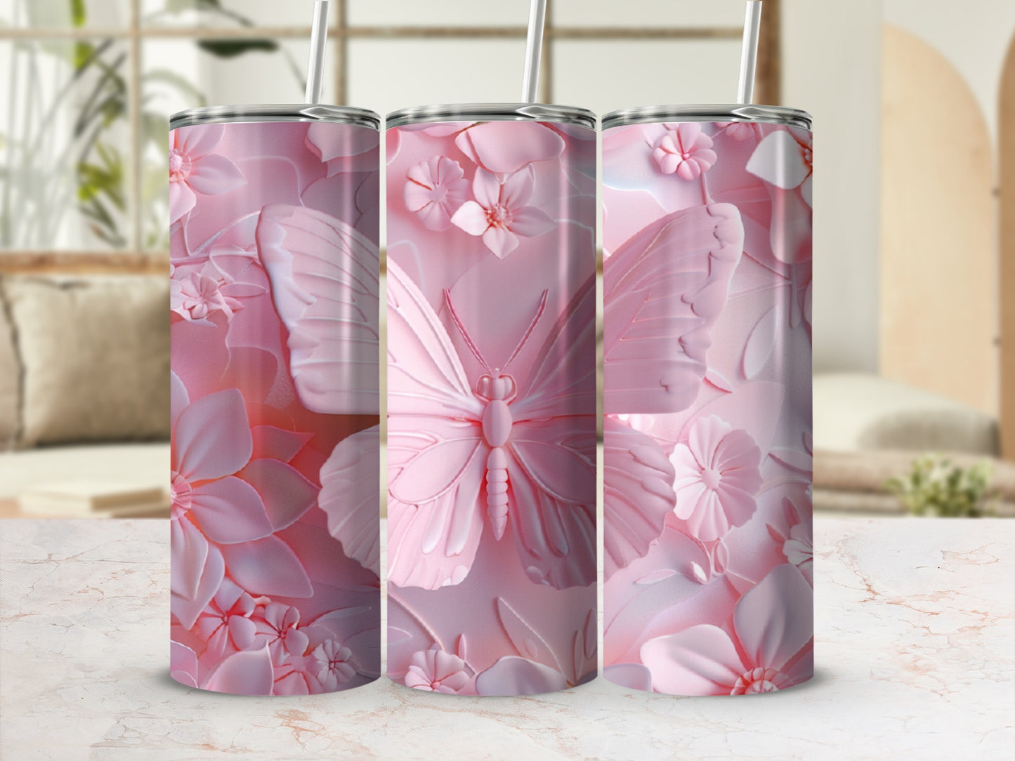 Pink floral and butterfly patterned tumbler set with straws.
